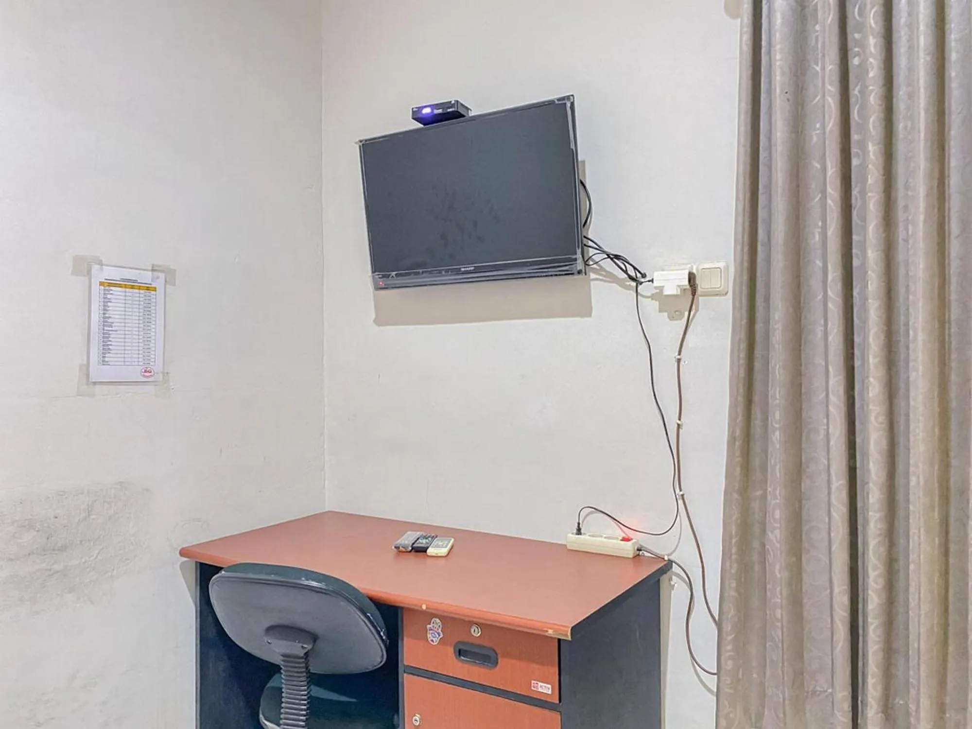 TV and multimedia in RedDoorz near Taman Flora Bratang Surabaya