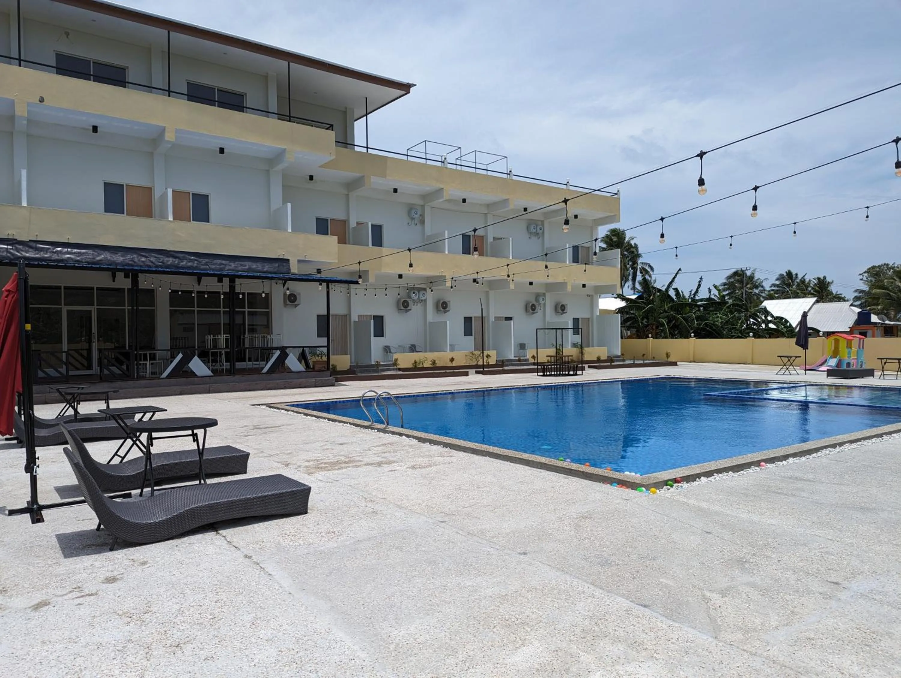 Swimming pool in Hotel Apex Dobo