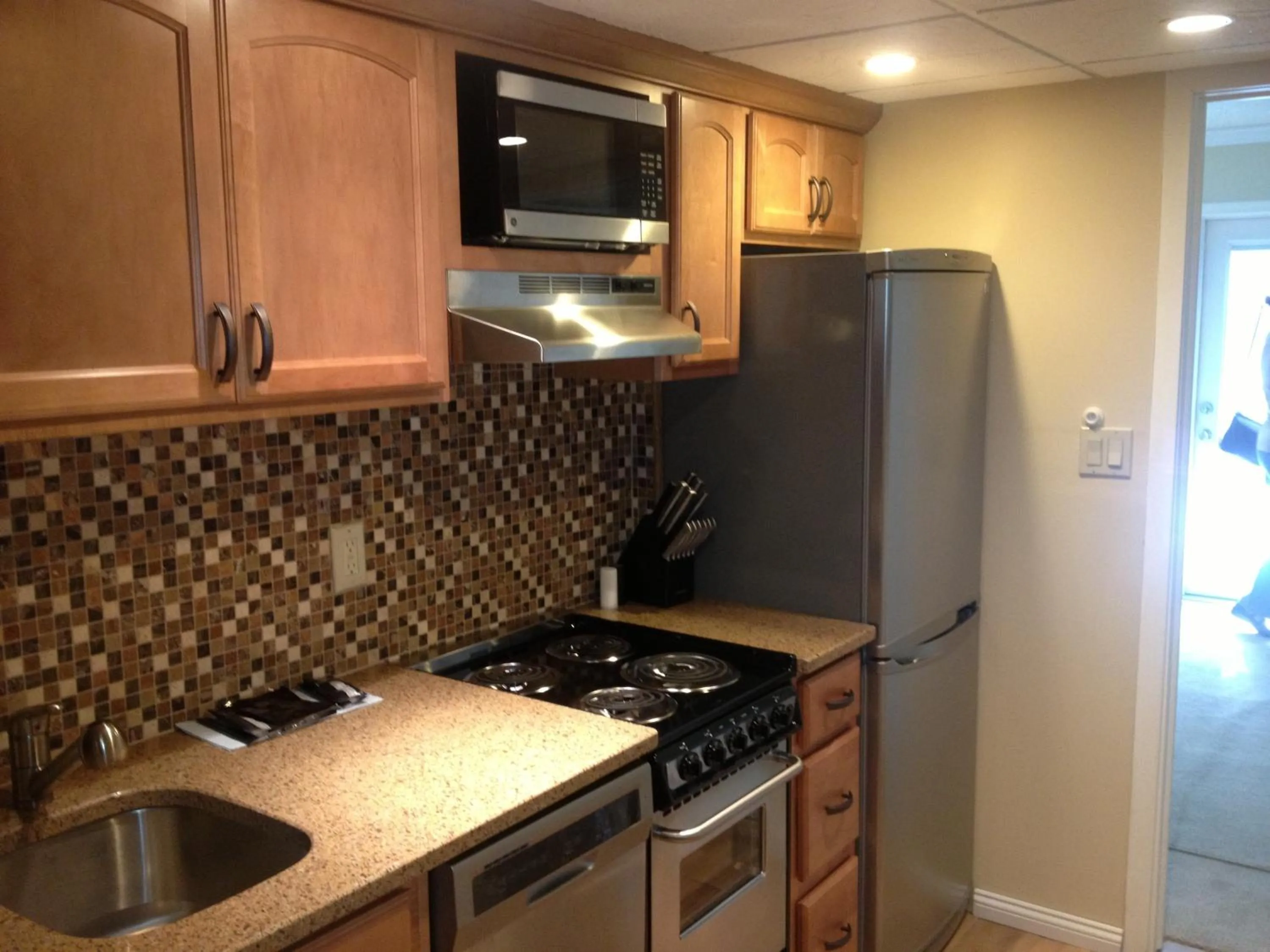 Kitchen or kitchenette in Biscayne Suites