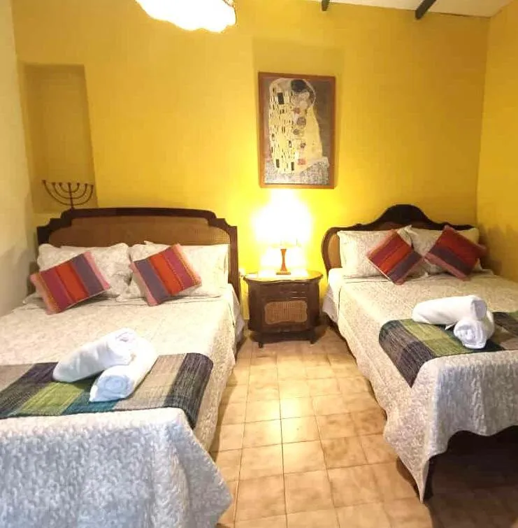 Bed in Posada Las Bromelias