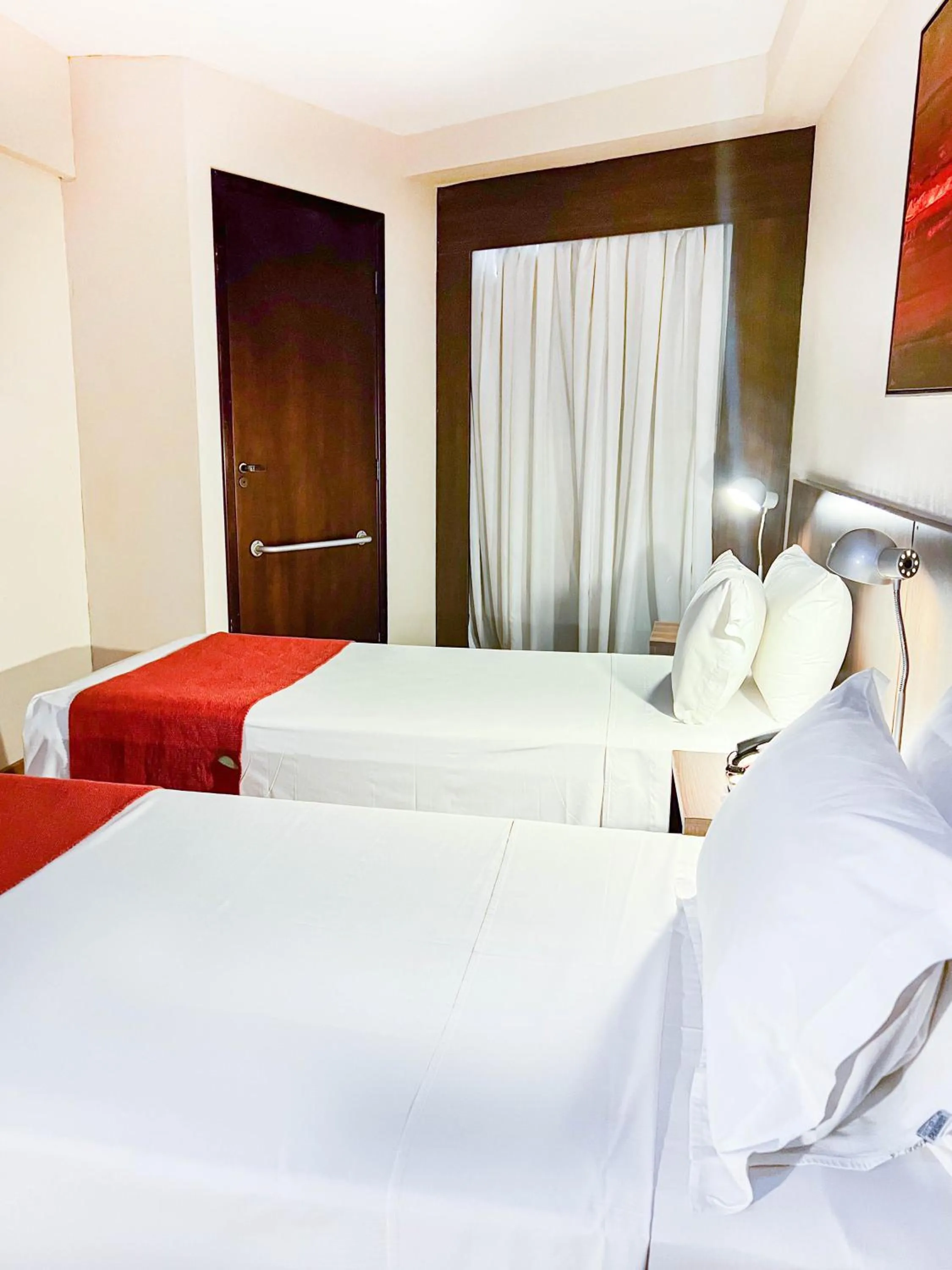 Bed in Royal Design Savassi Hotel