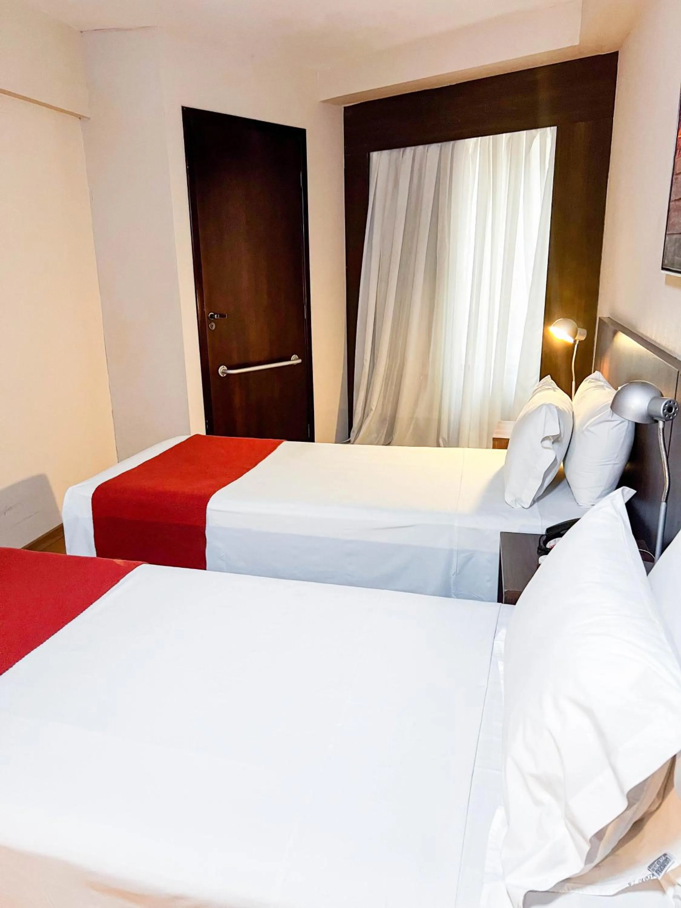 Bed in Royal Design Savassi Hotel