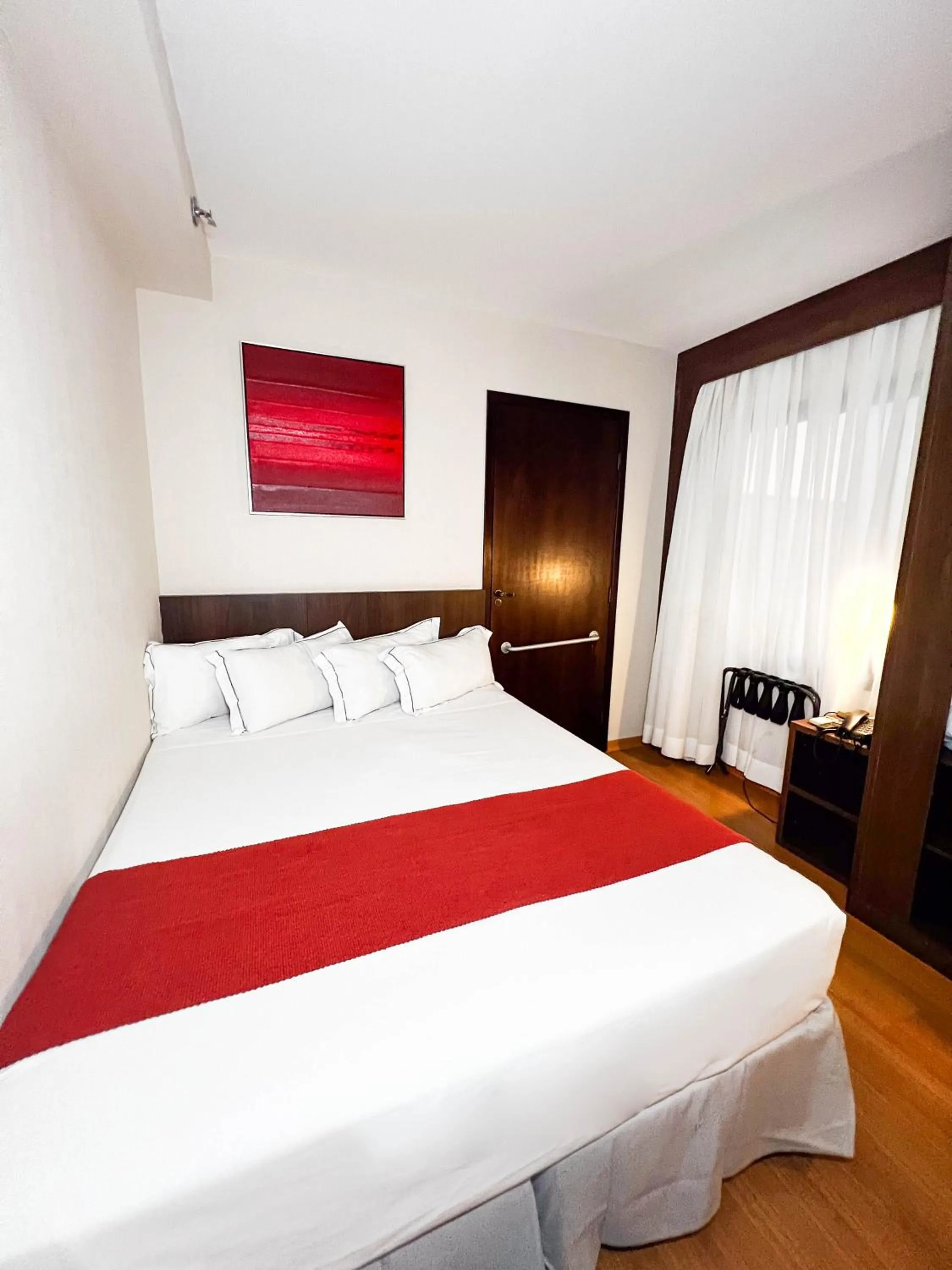 Bed in Royal Design Savassi Hotel