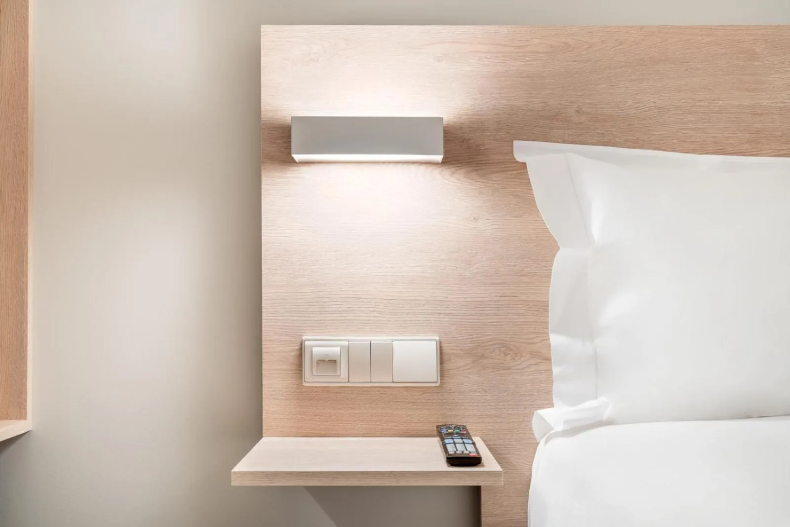 Bed in Moov Hotel Lisboa Oriente