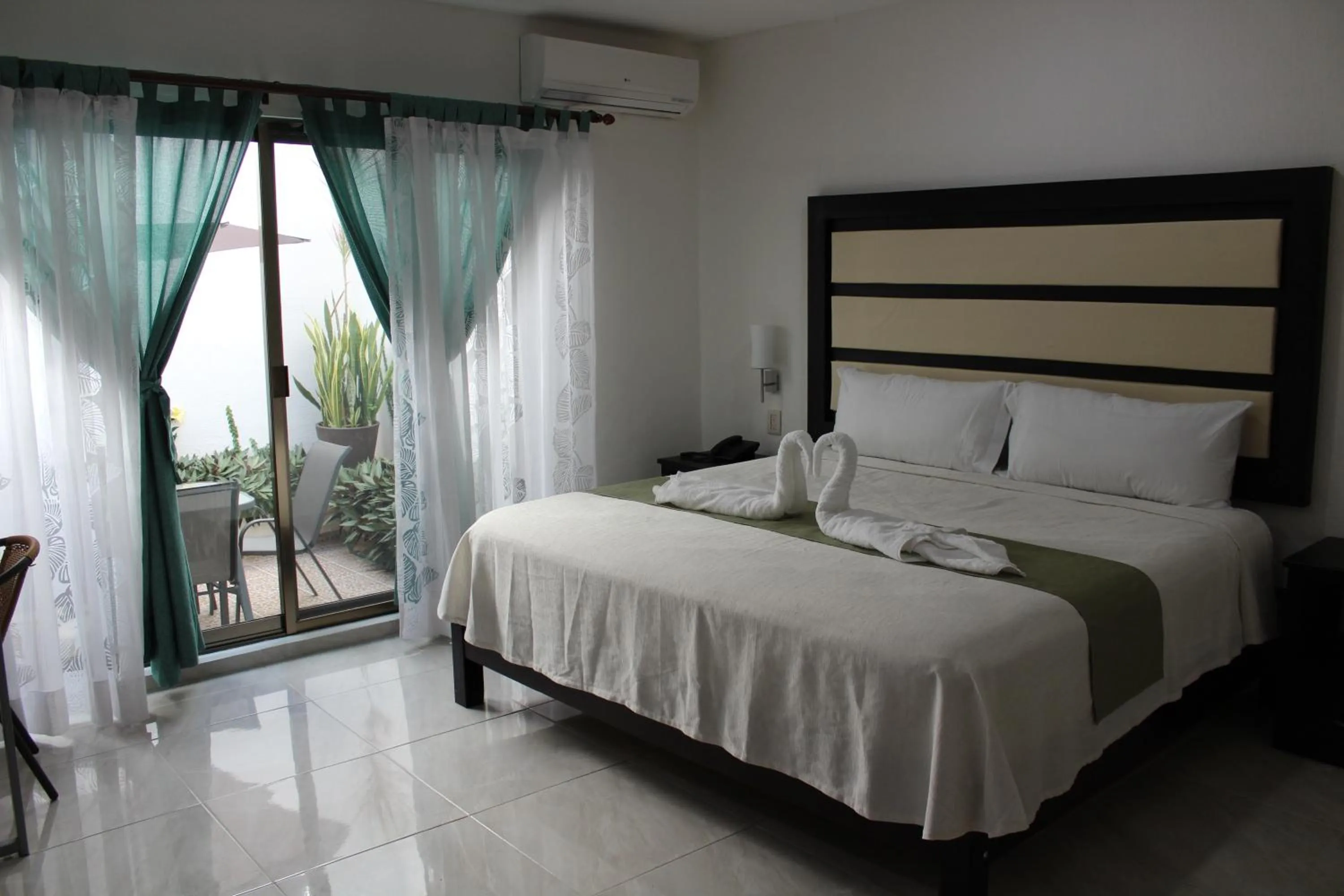 Bed in Hotel Malecón