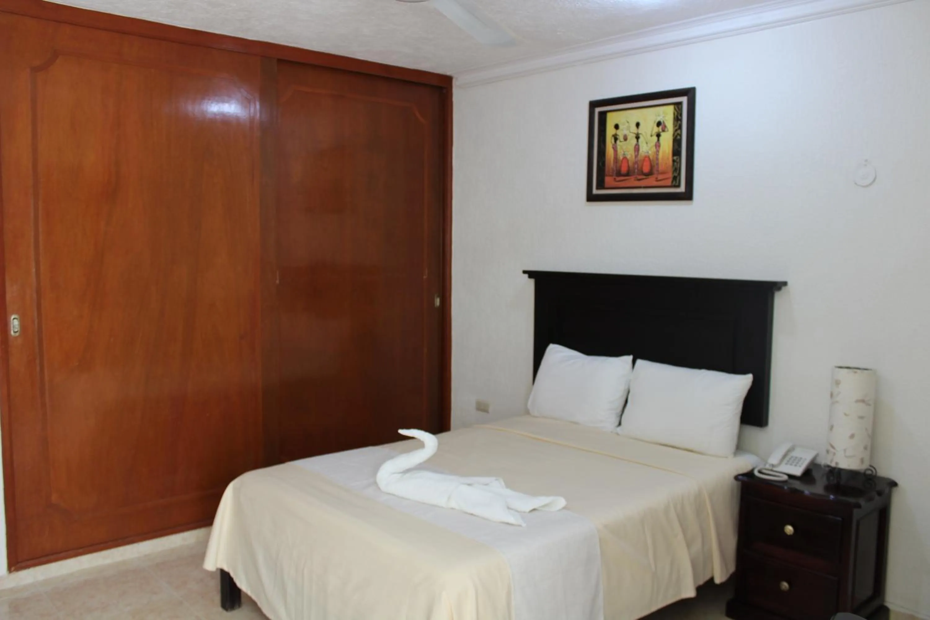 Bed in Hotel Malecón