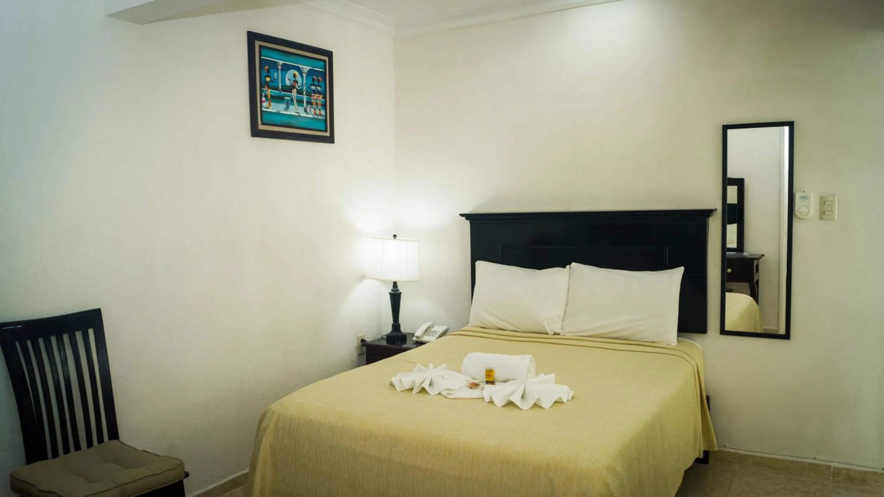 Bed in Hotel Malecón