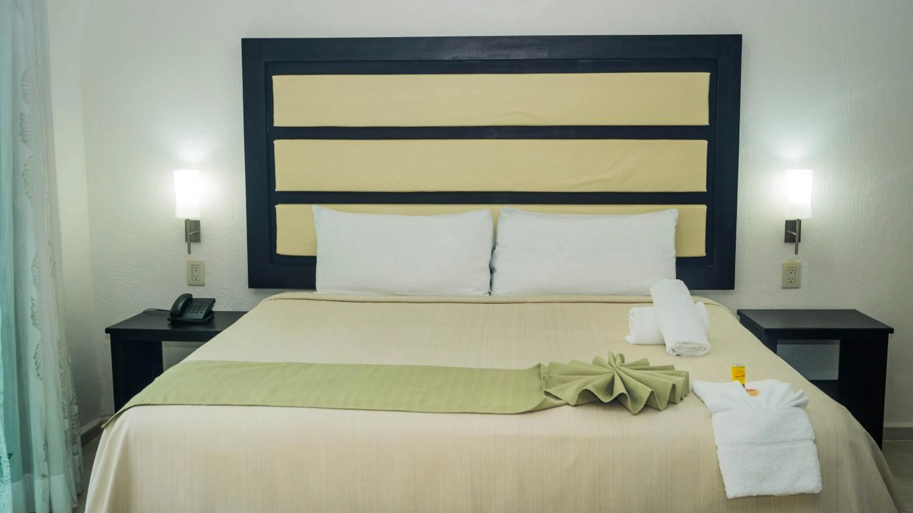 Bed in Hotel Malecón