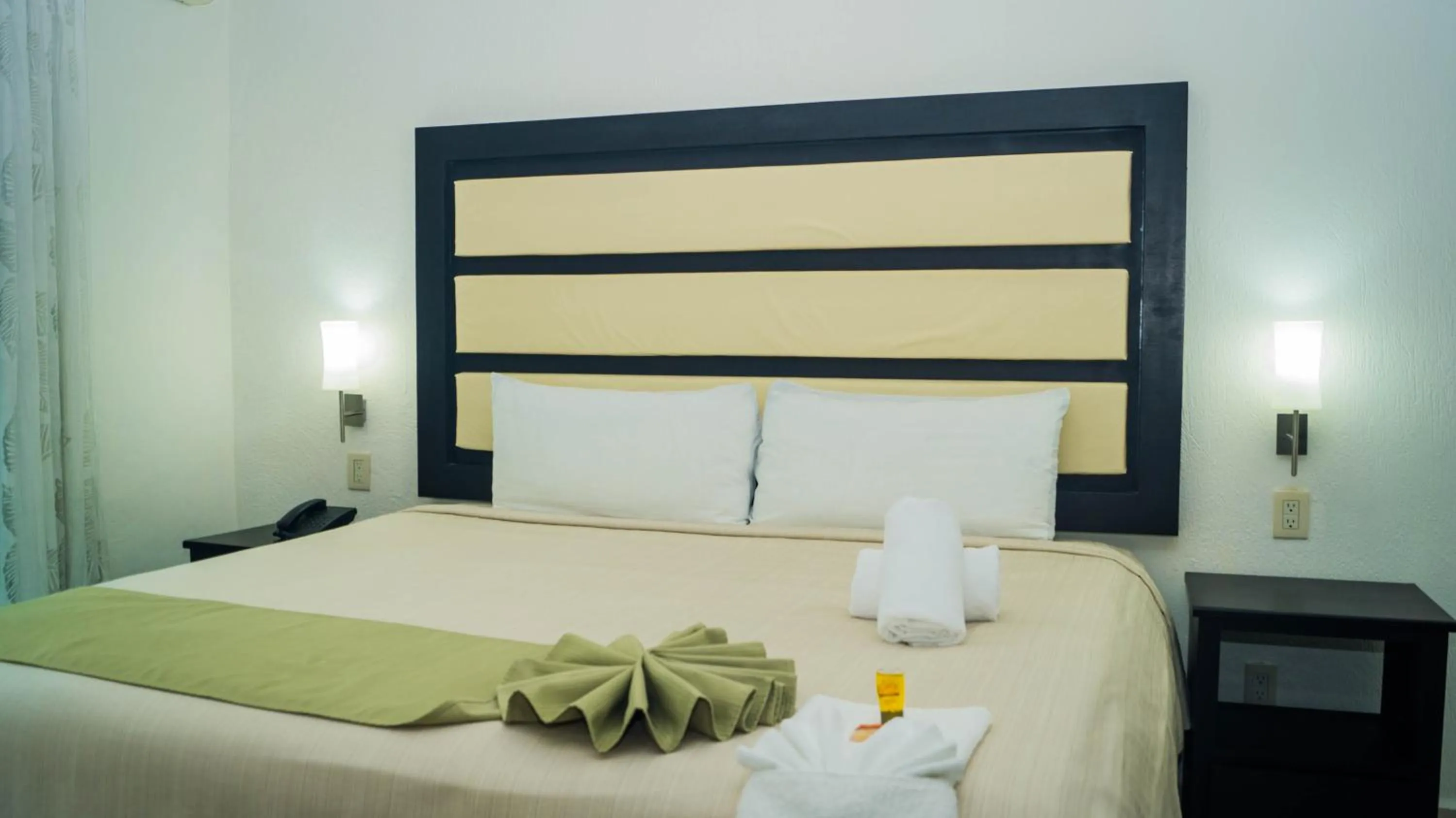 Bed in Hotel Malecón