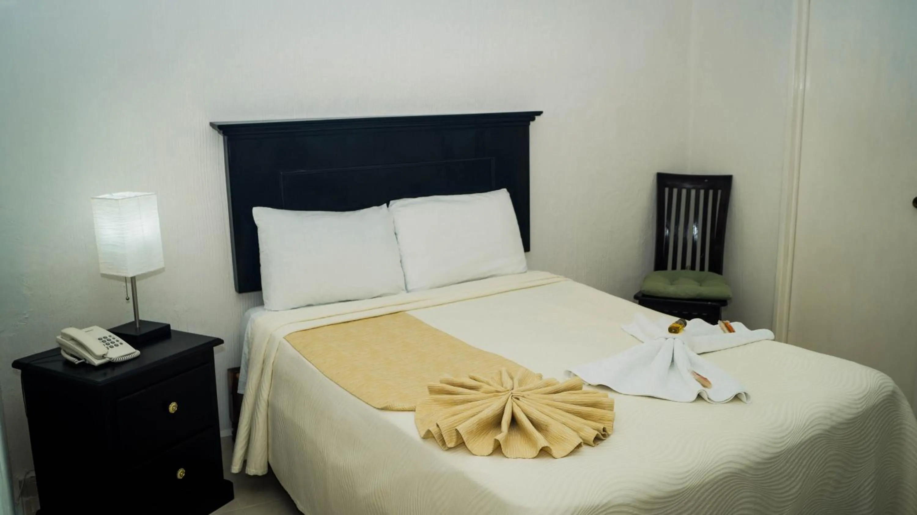 Bed in Hotel Malecón