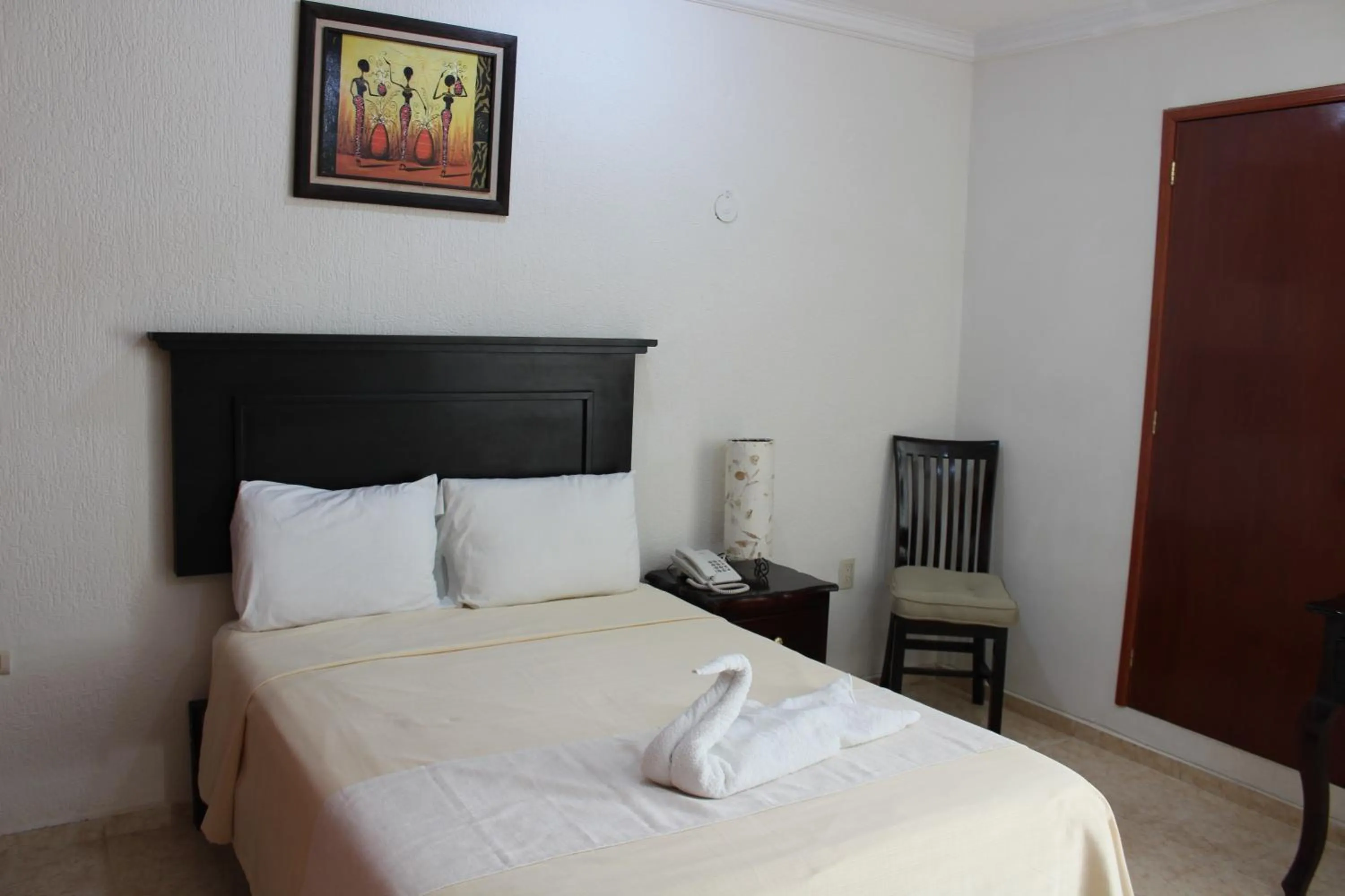 Bed in Hotel Malecón