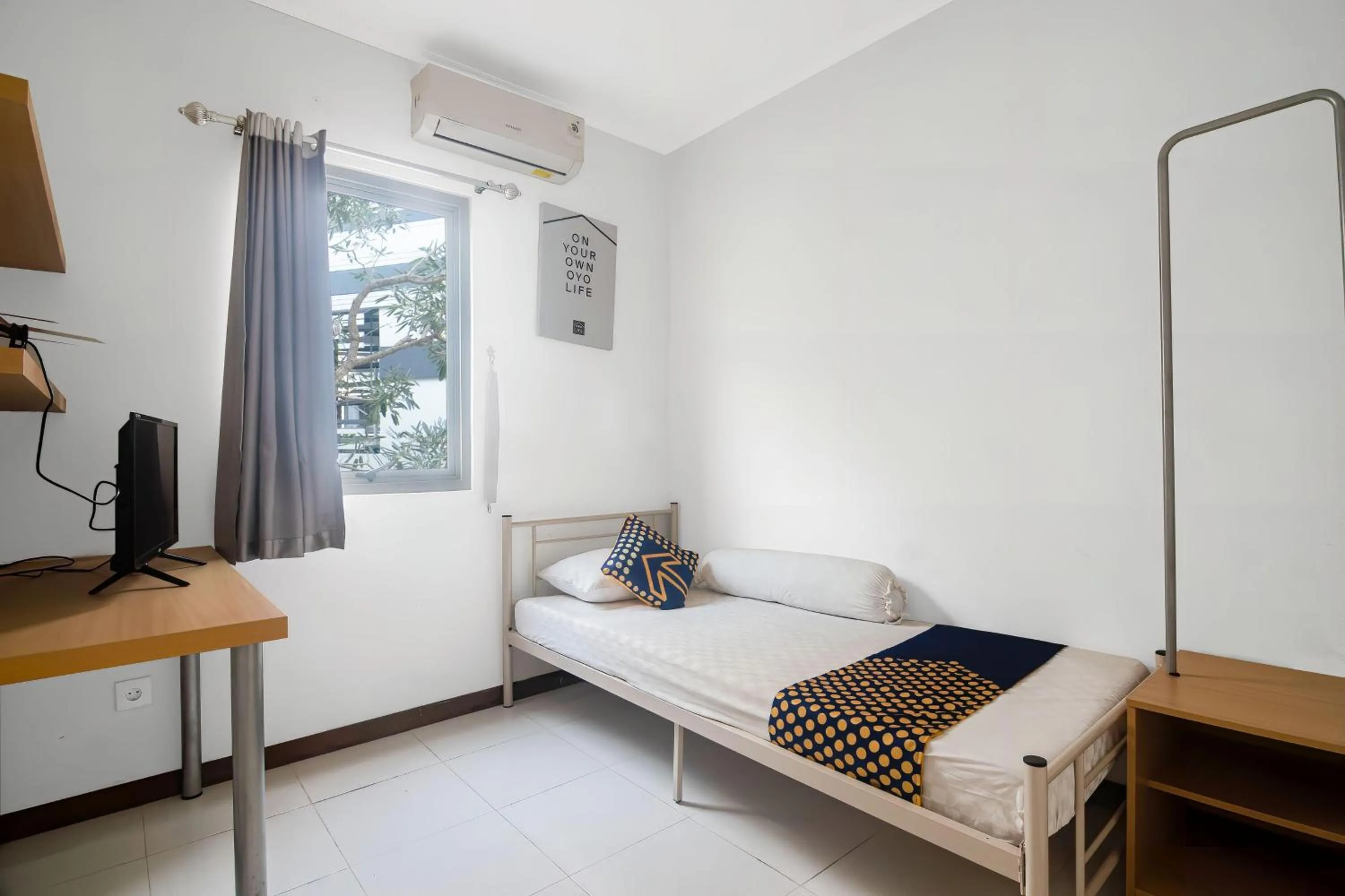 Bedroom in Hotel O Anartha Residence