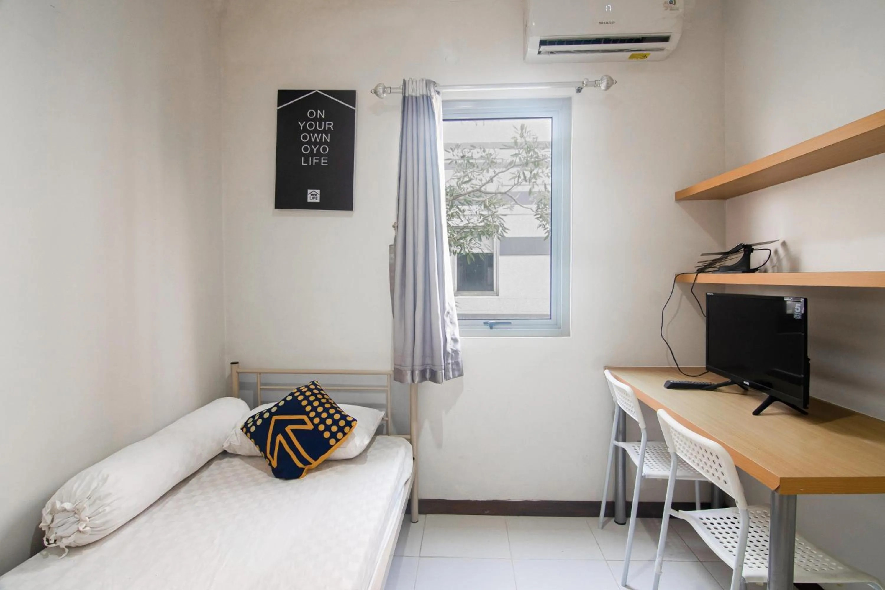 Bedroom in Hotel O Anartha Residence
