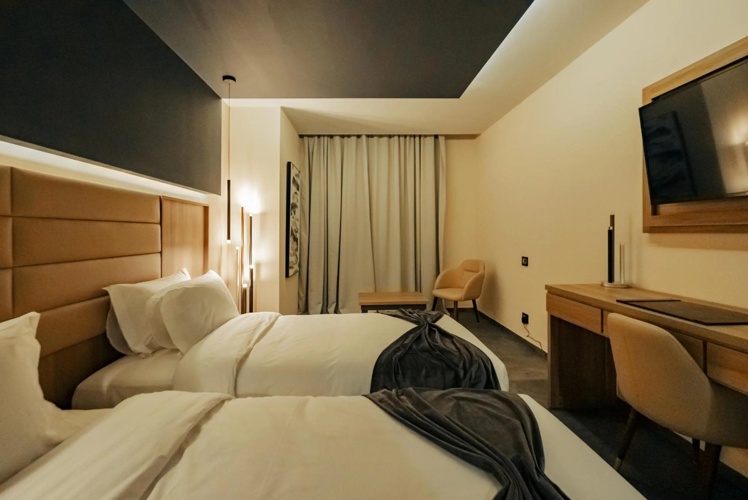 Bed in AD HOTEL HYDRA