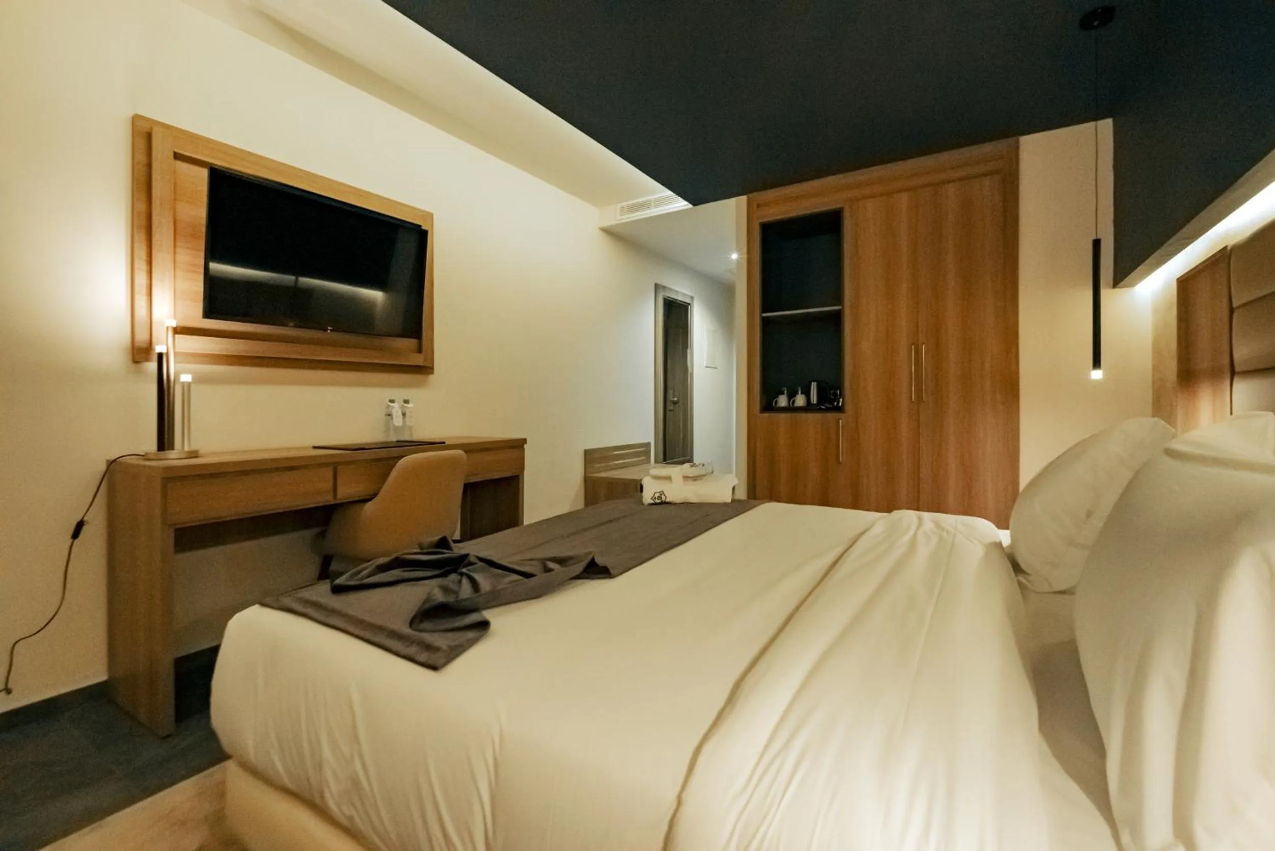 Bed in AD HOTEL HYDRA