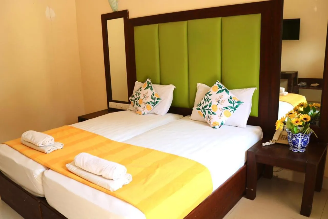 Bed in Riverside Regency Resort