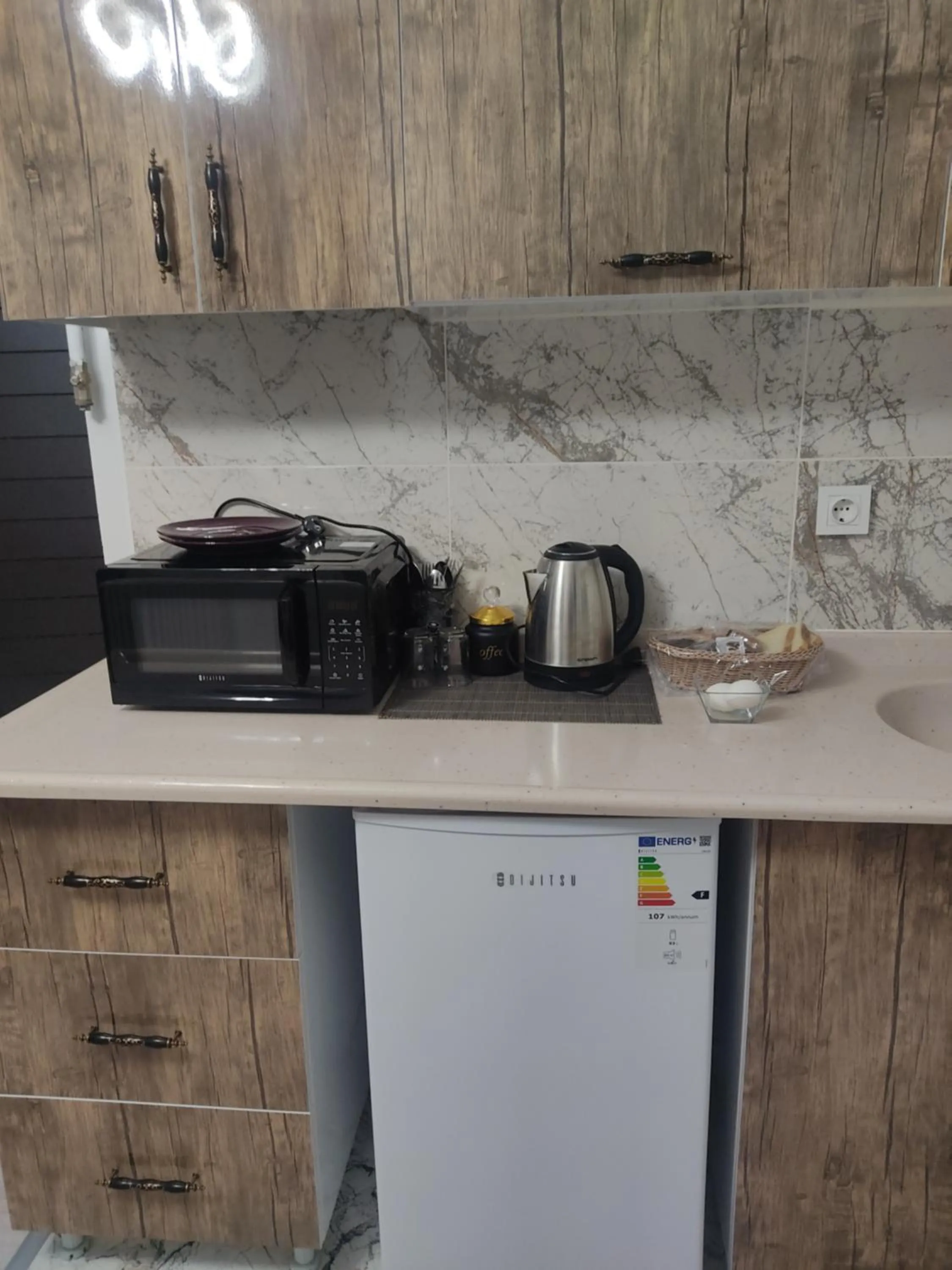 Kitchen or kitchenette in istanbul airport family suites hotel