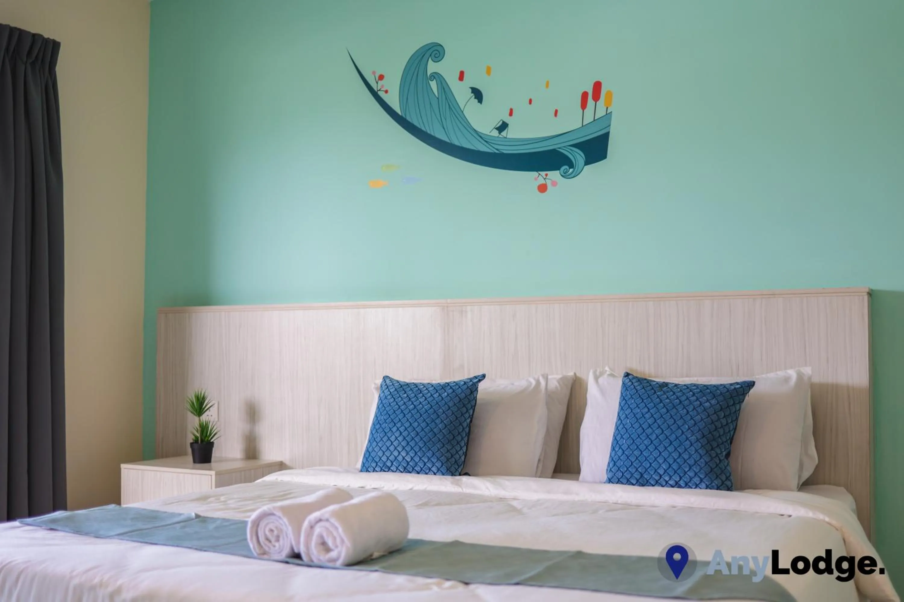 Bed in AnyLodge Waterfront Marina Island Pangkor