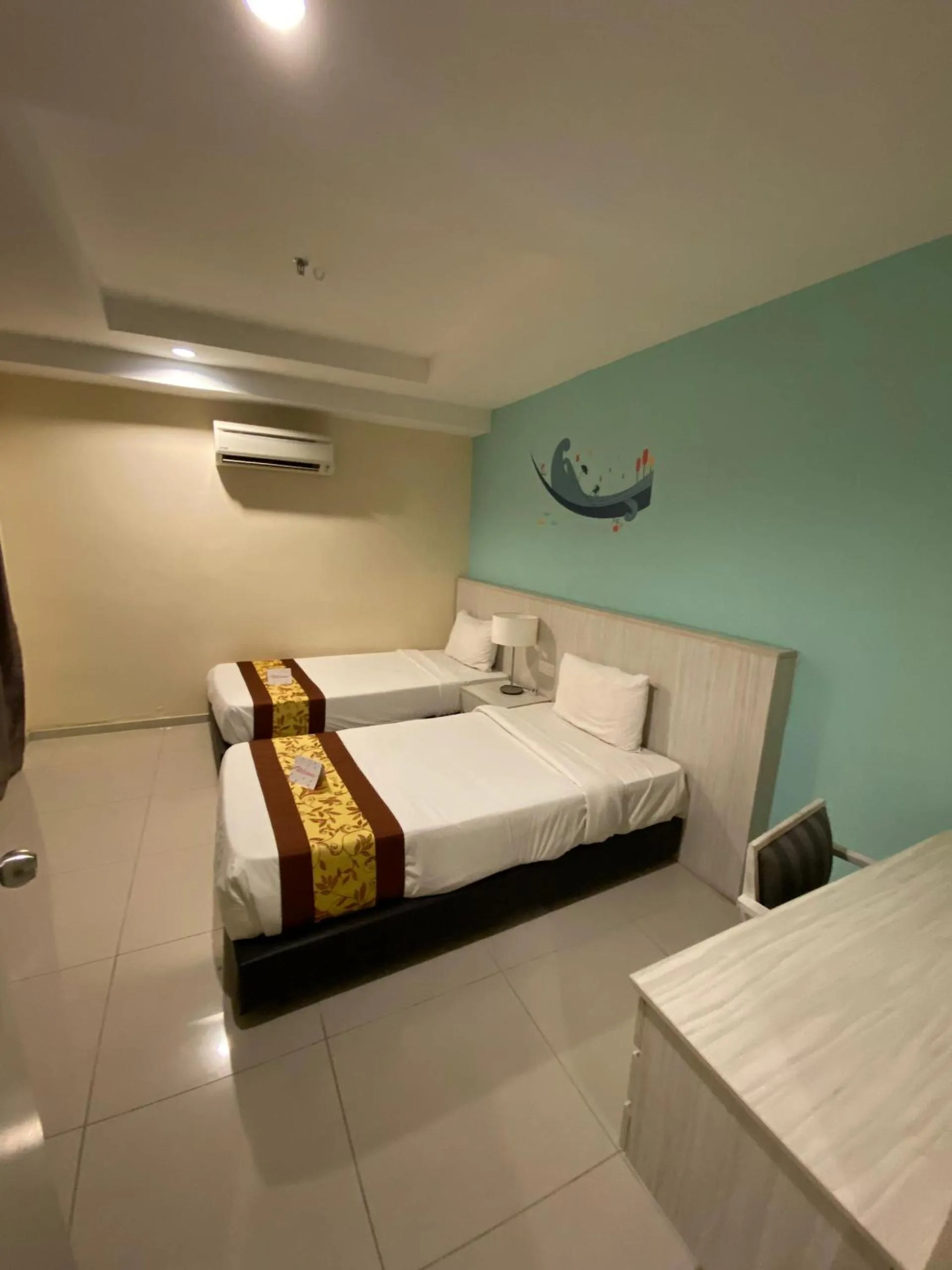 Bed in AnyLodge Waterfront Marina Island Pangkor