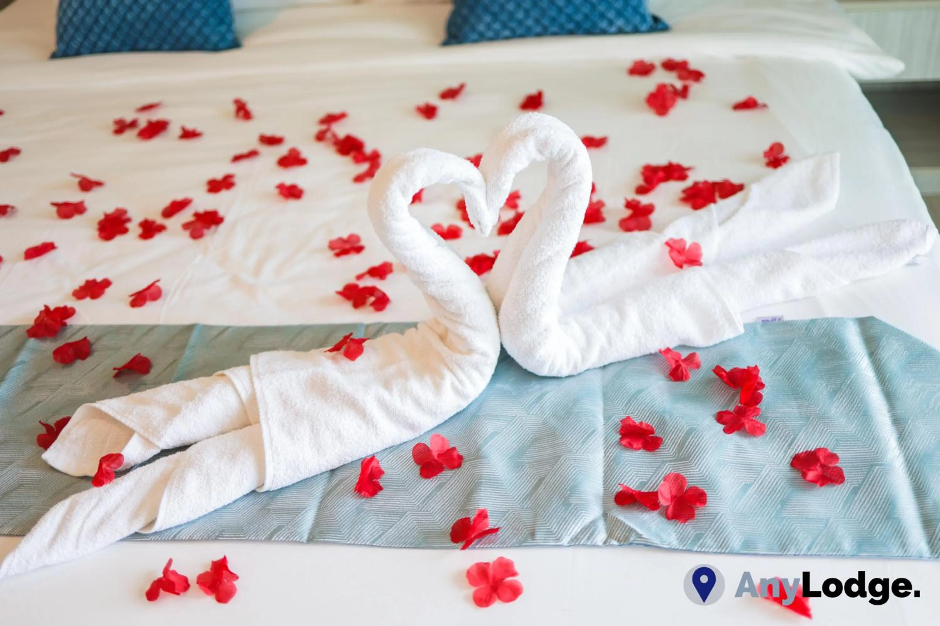 towels, Bed in AnyLodge Waterfront Marina Island Pangkor