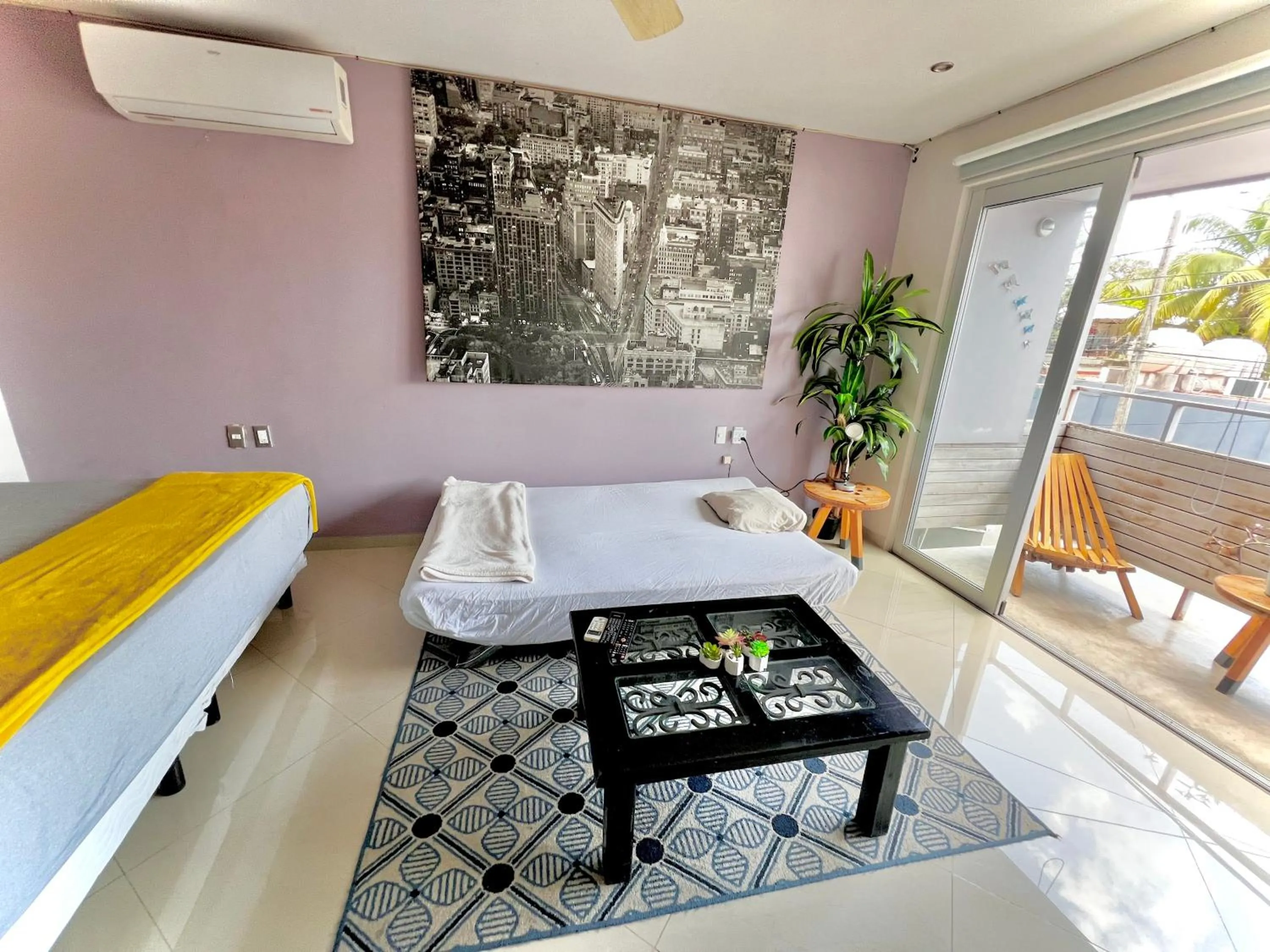 Bed in Playa Centro Rooftop Apartments & Studios