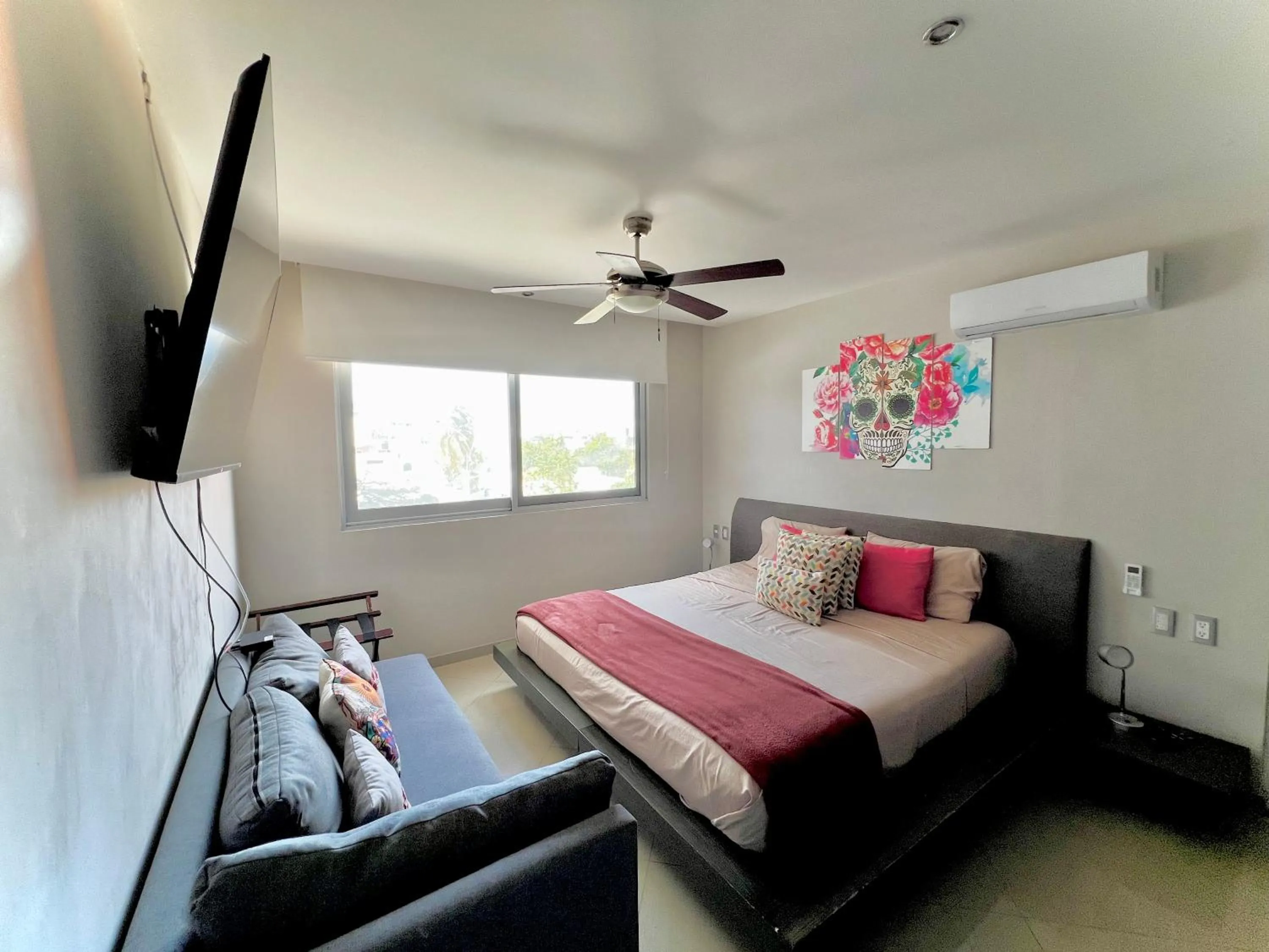 Bed in Playa Centro Rooftop Apartments & Studios