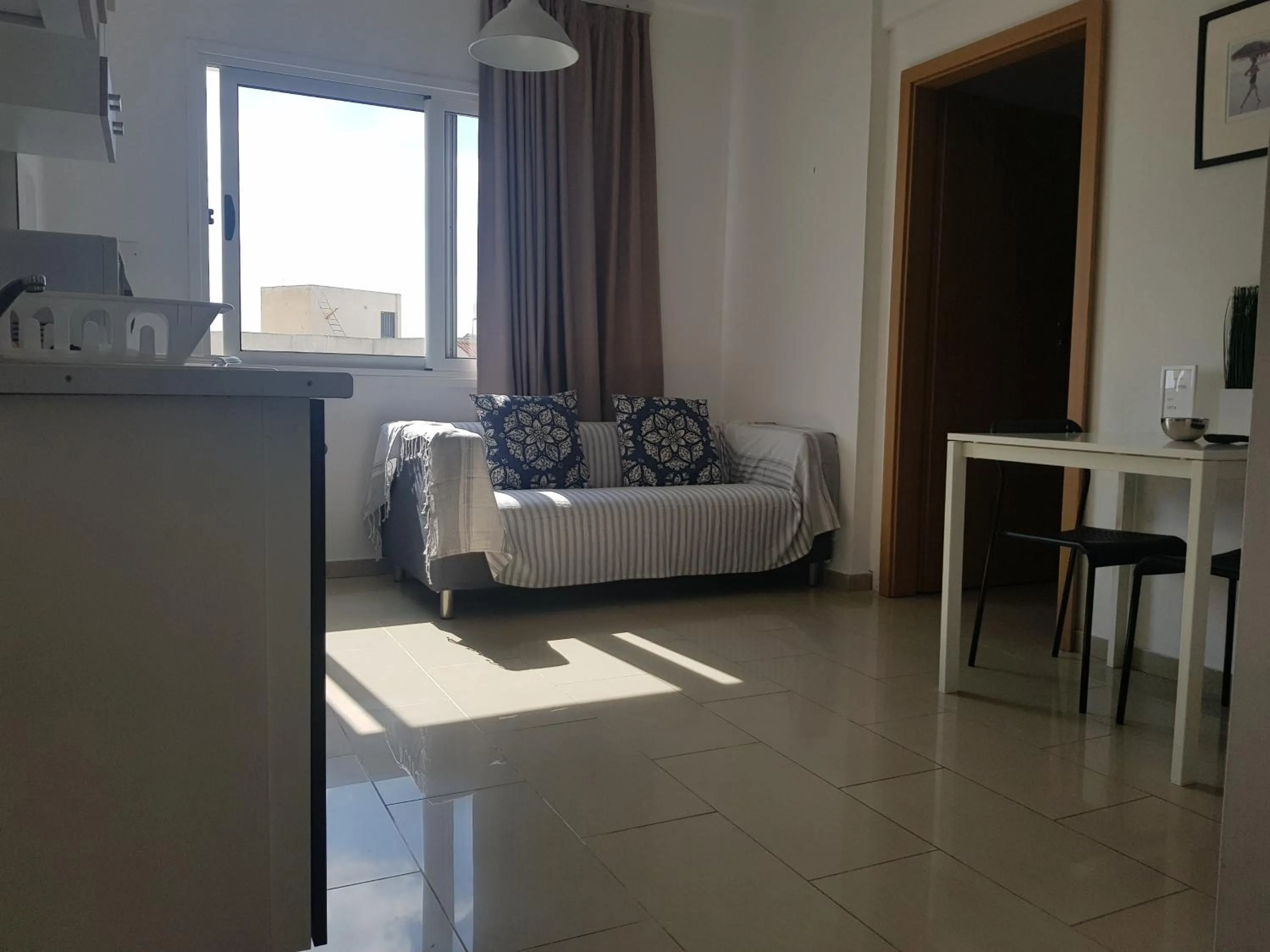 Bed in Valentinos Apartments