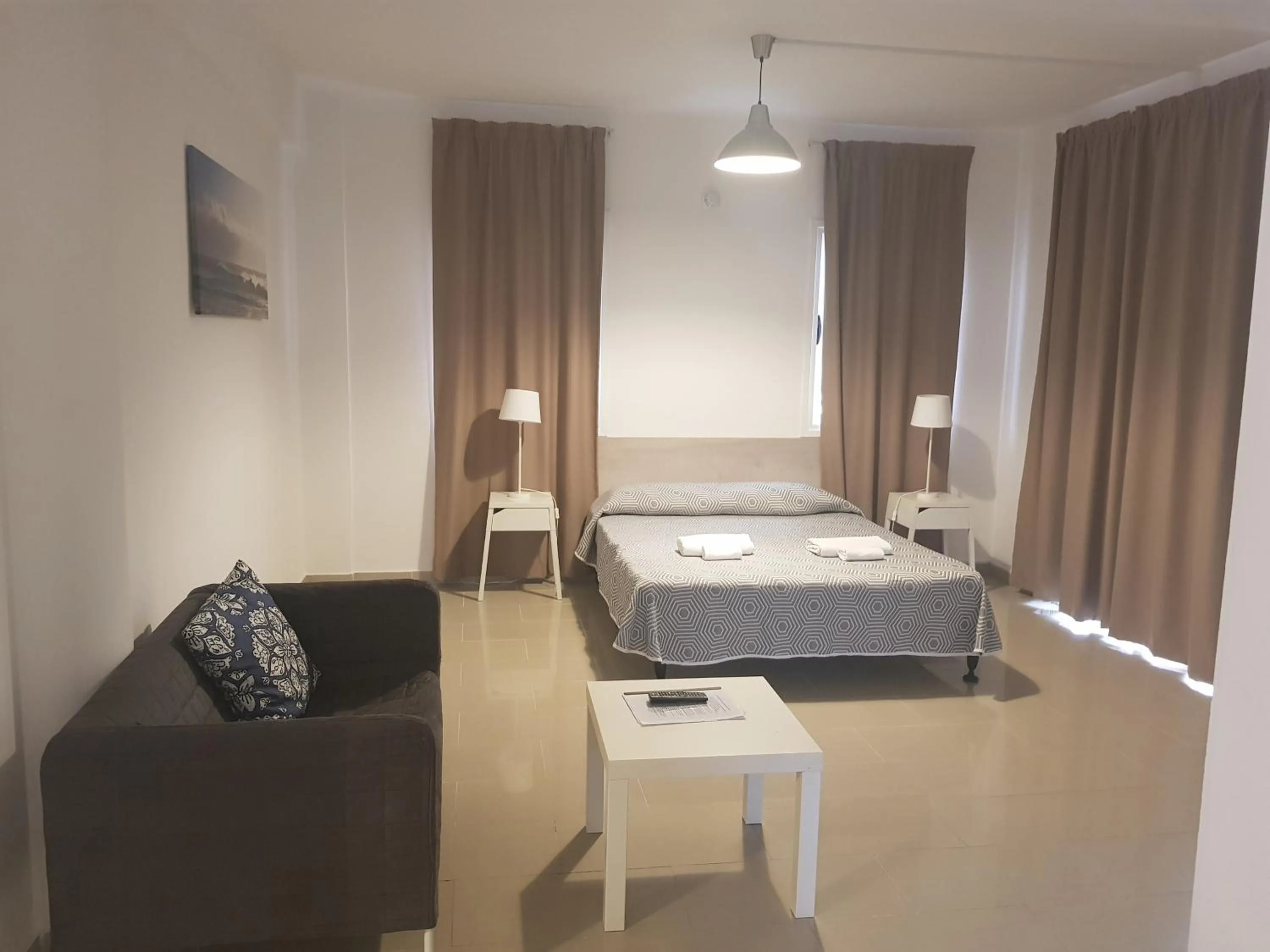 Bed in Valentinos Apartments