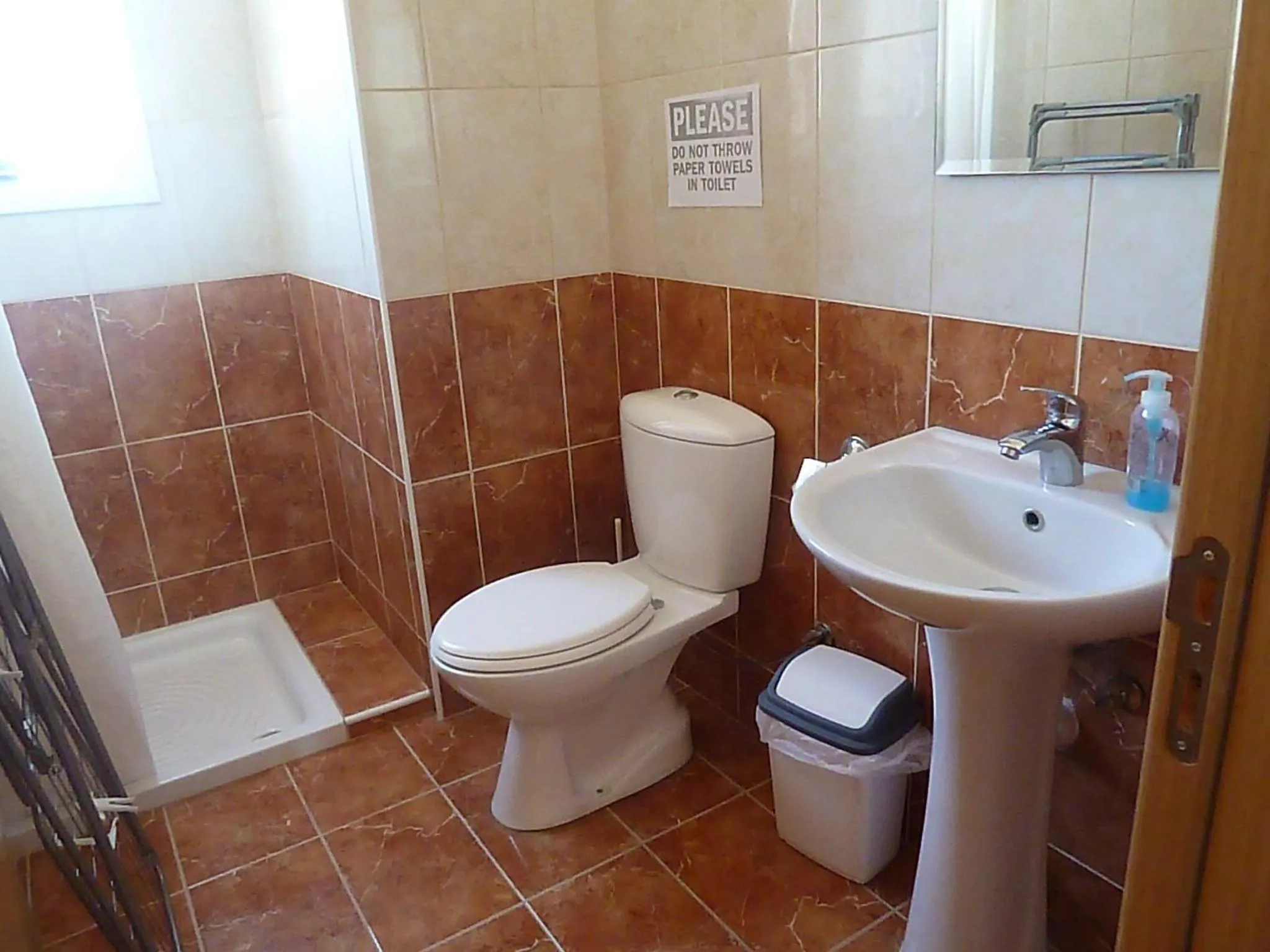 Bathroom in Valentinos Apartments