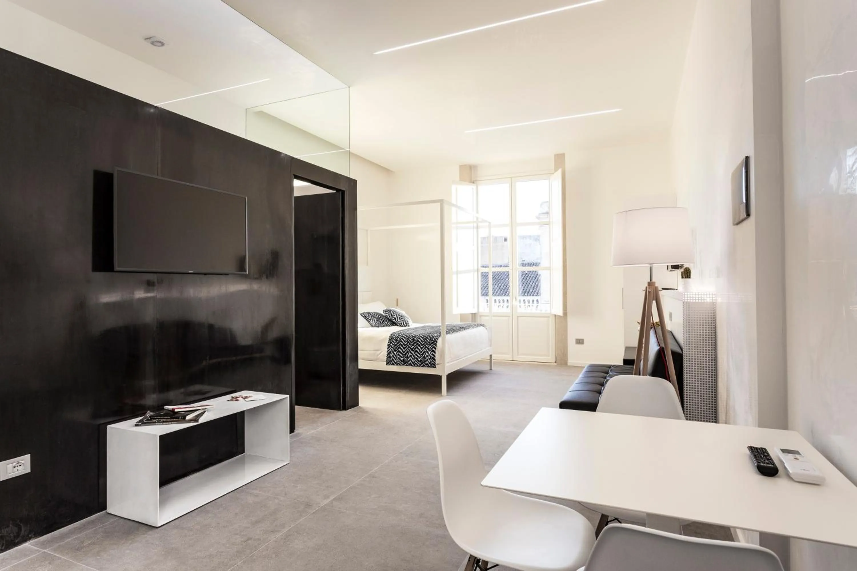 Bed in Nostos rooms & Apartments