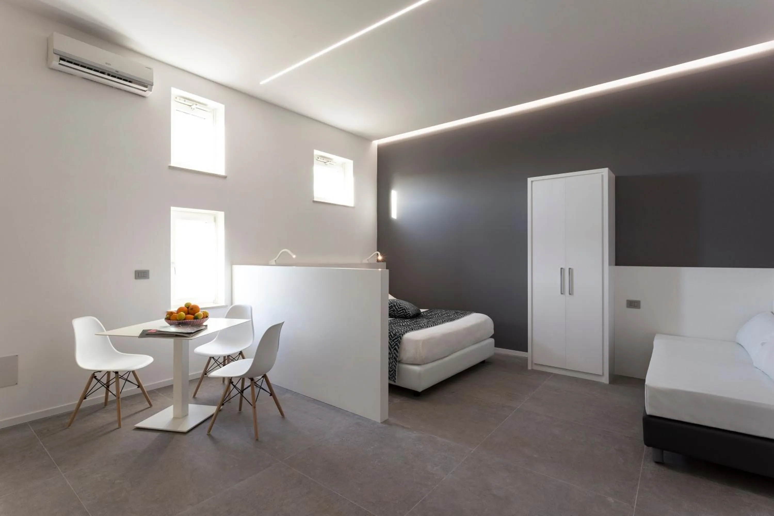 Living room, Bed in Nostos rooms & Apartments