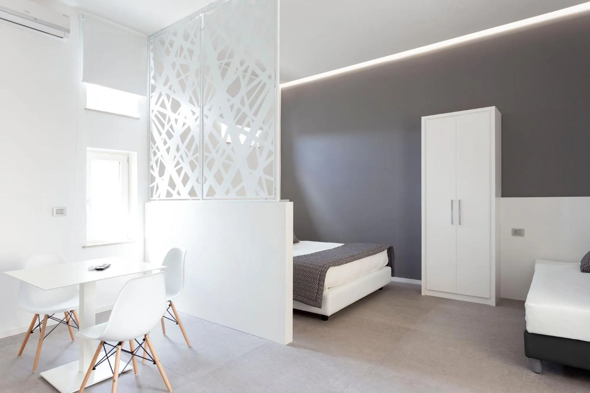 Bed in Nostos rooms & Apartments