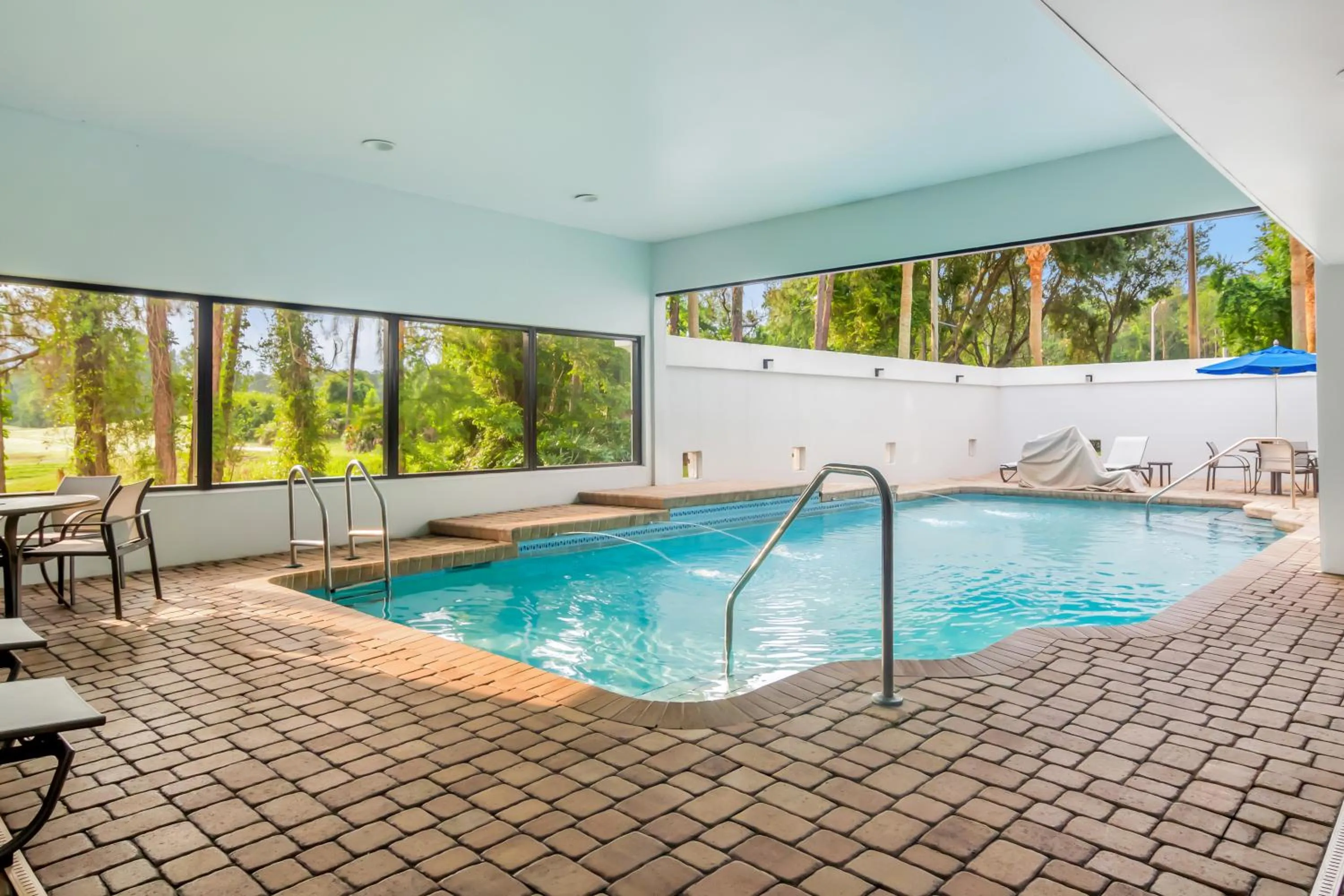 Swimming pool in Holiday Inn Express & Suites Jacksonville South East - Medical Center Area by IHG