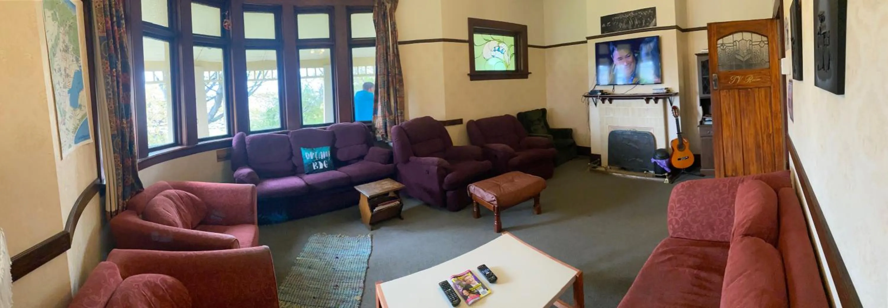 Communal lounge/ TV room, Seating Area in Manor house backpackers