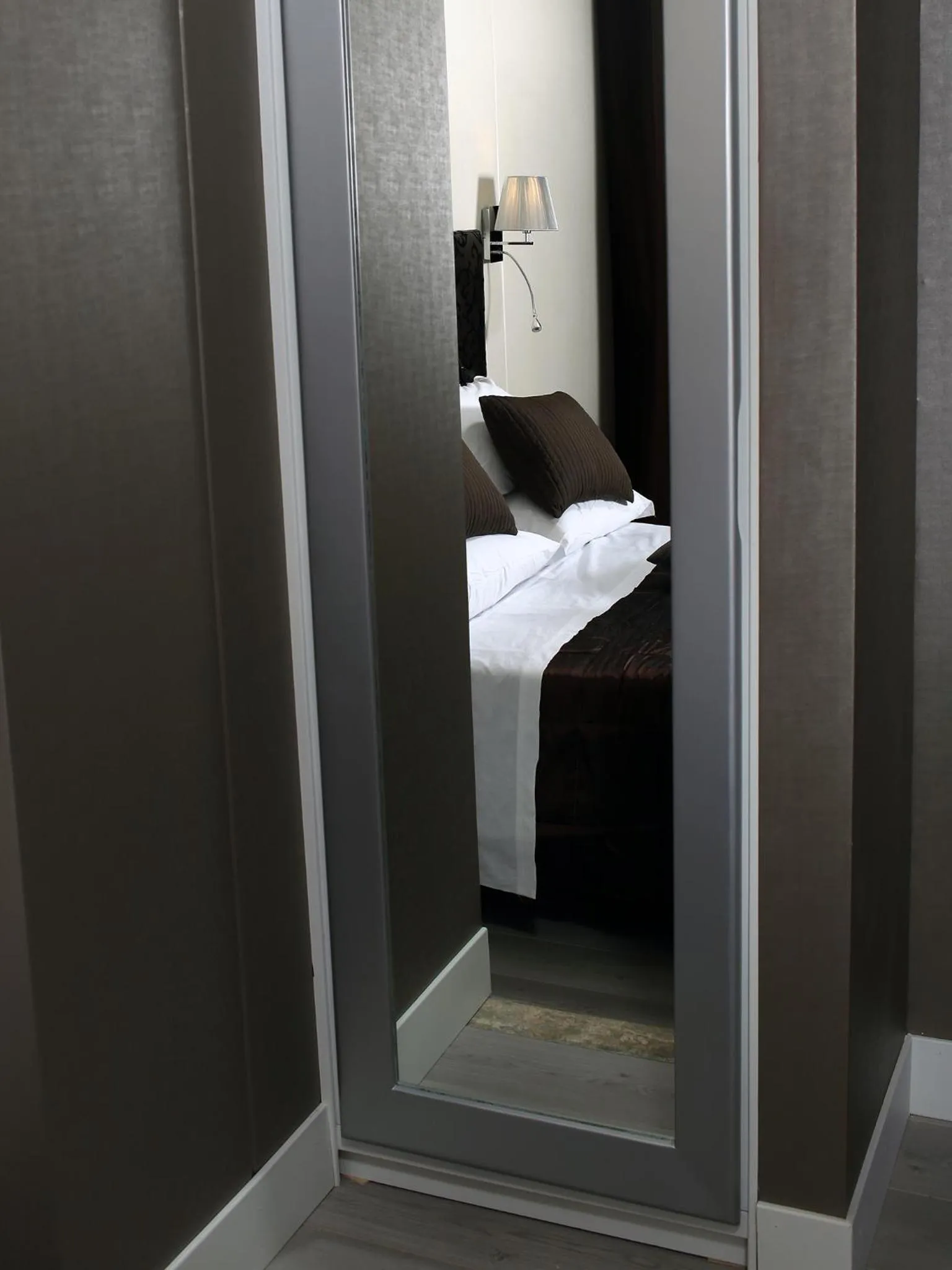 Decorative detail, Bed in Piccolo di Piazza di Spagna Suites