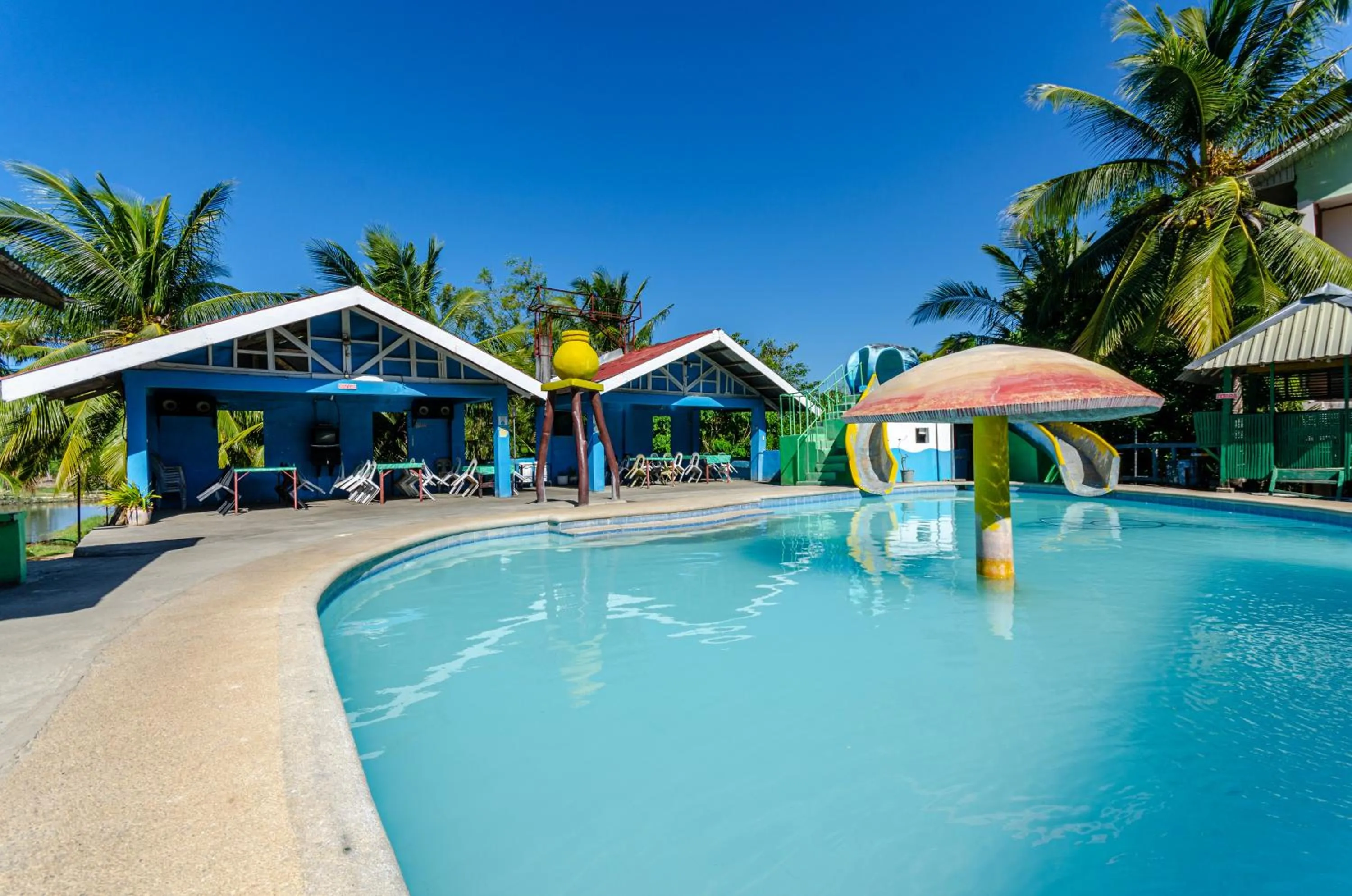 Swimming pool in Magsaysay Hillside Resort powered by Cocotel