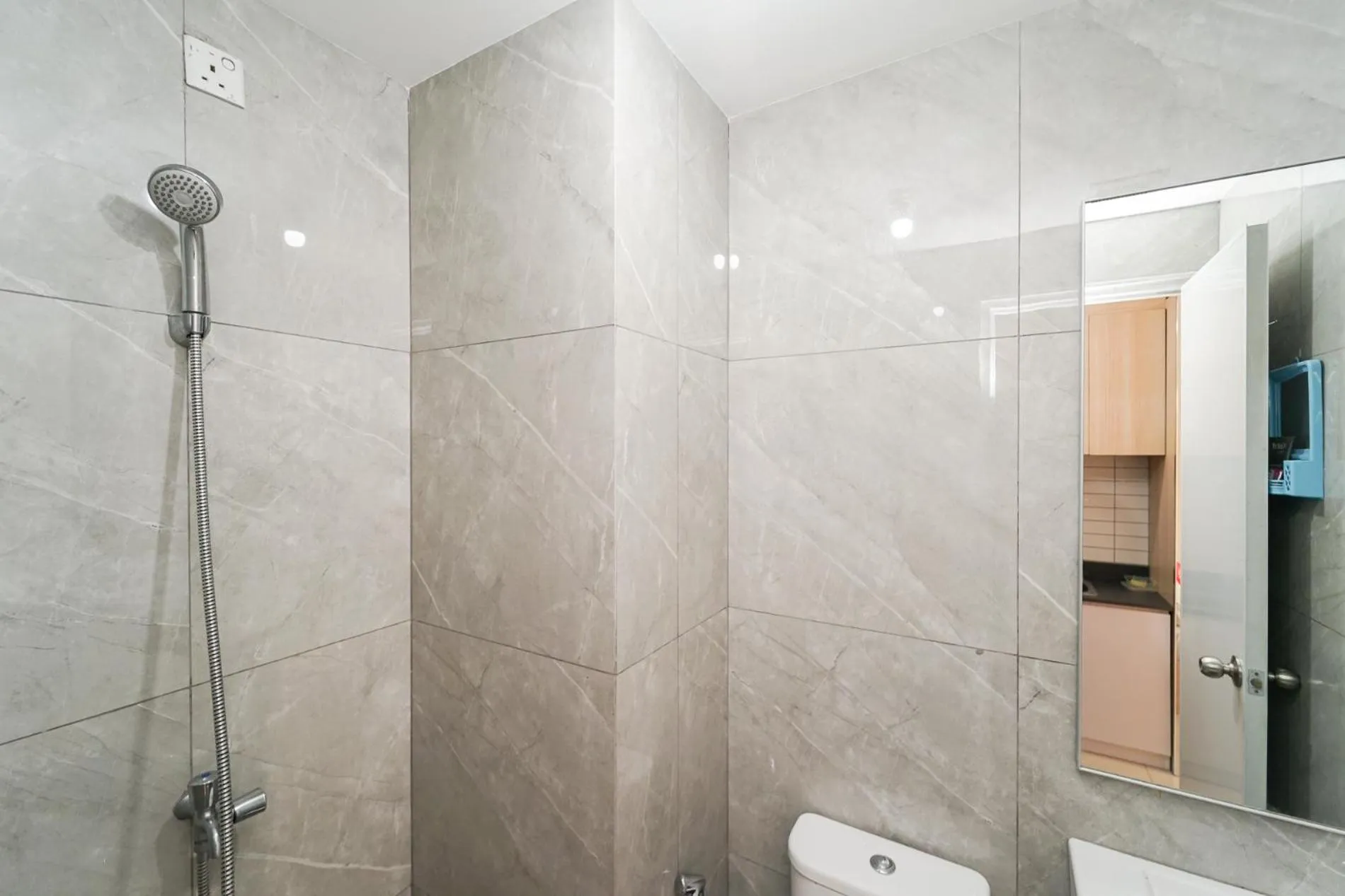 Shower in RedLiving Apartemen Sayana - Premium Property