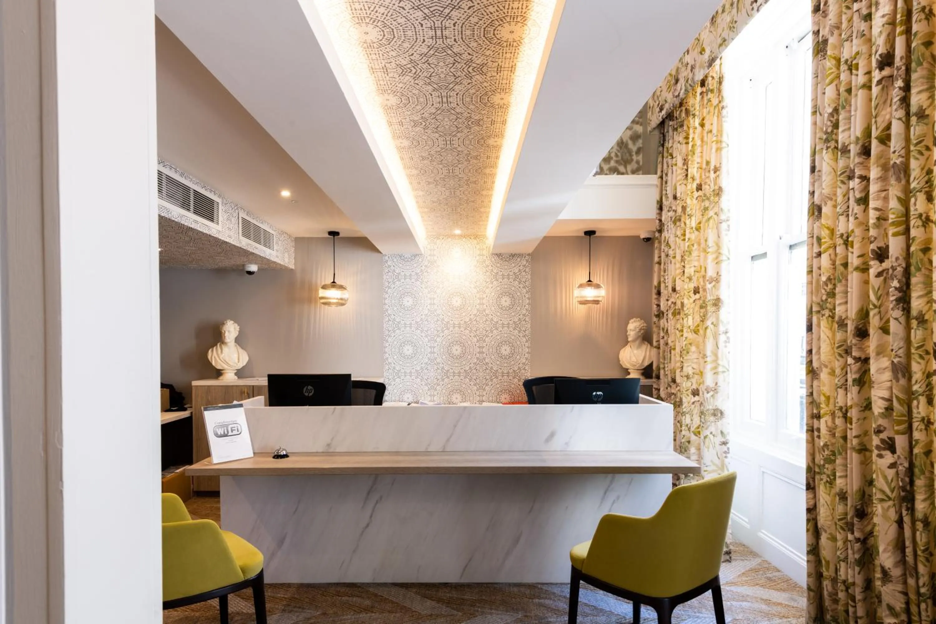 Lobby or reception in Byron Hotel