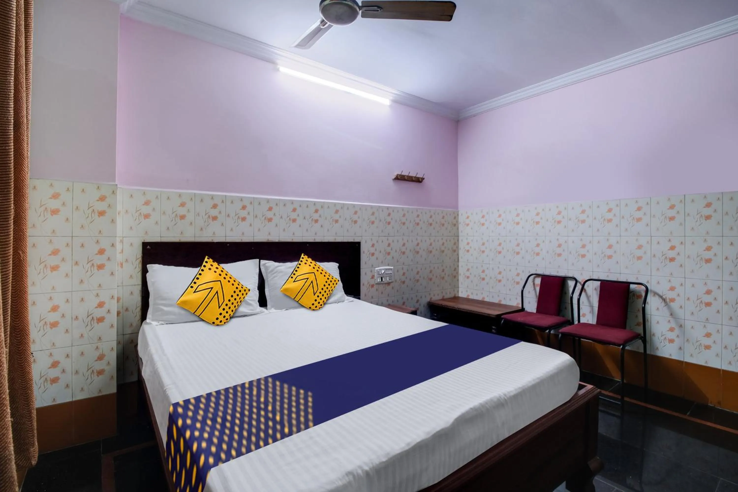 Bedroom in Hotel O Sir Vr Sairam Lodge
