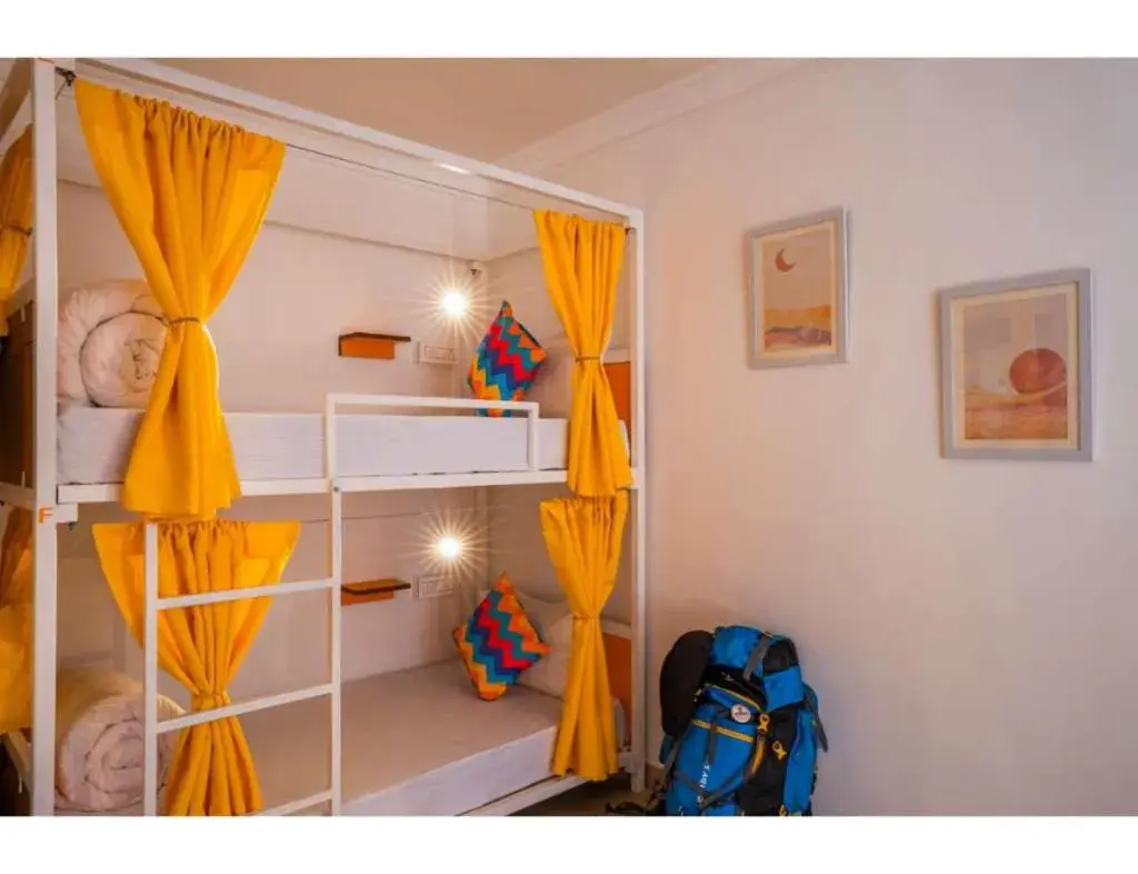 Bed in 8 Bed Mixed Dormitory A/C Room with Ensuite Bathroom in goSTOPS Srinagar Bed in 8 Bed Mixed Dormitory A/C Room with Ensuite Bathroom in goSTOPS Srinagar