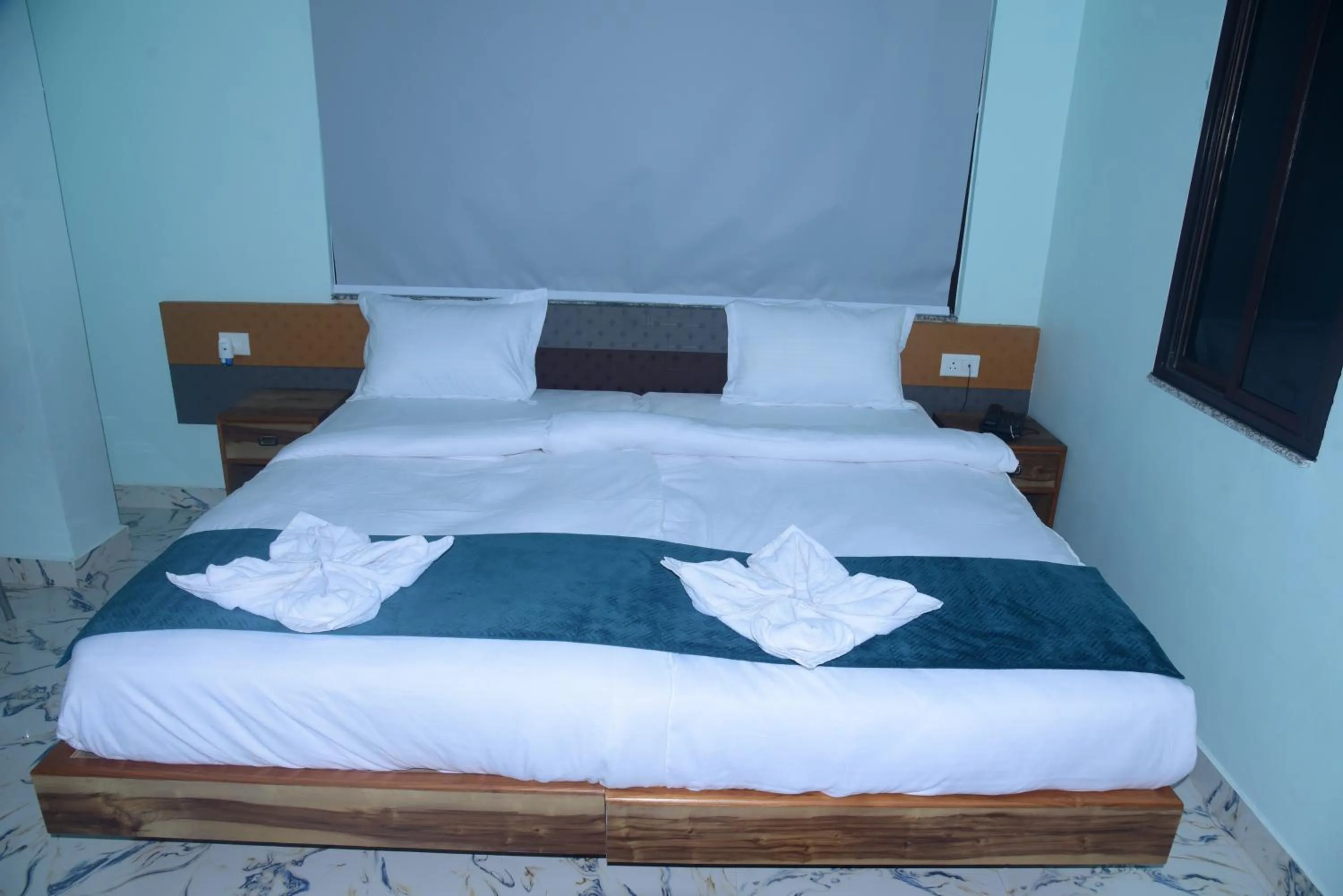 Bed in Hotel Gridhakuta International