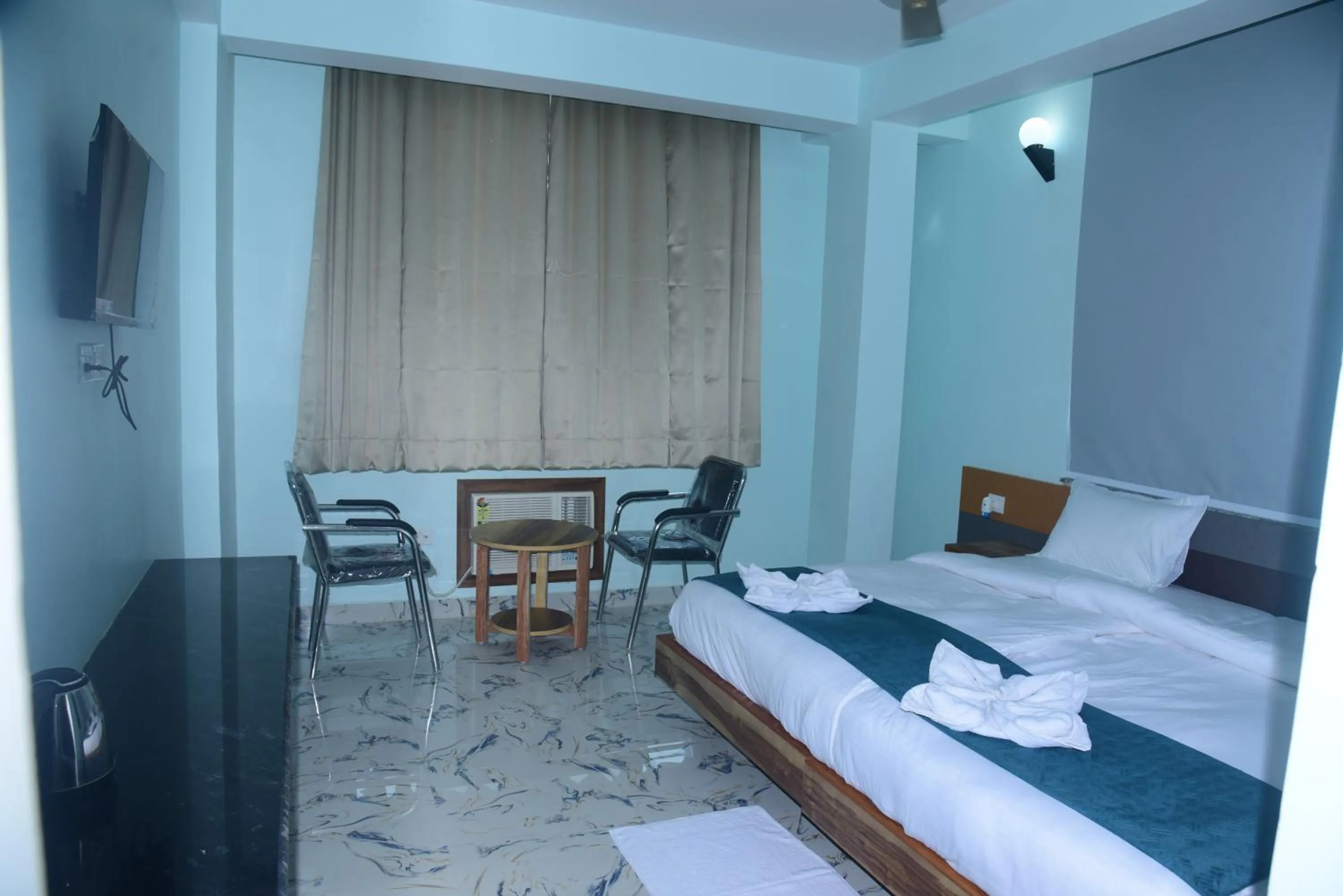 Bed in Hotel Gridhakuta International