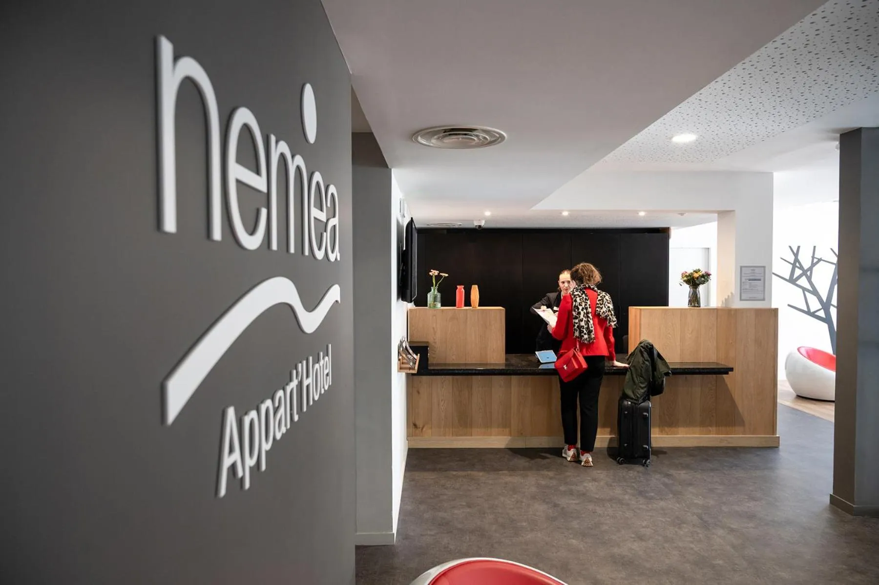 Lobby or reception in Nemea Appart Hotel Coliseum Amiens Centre