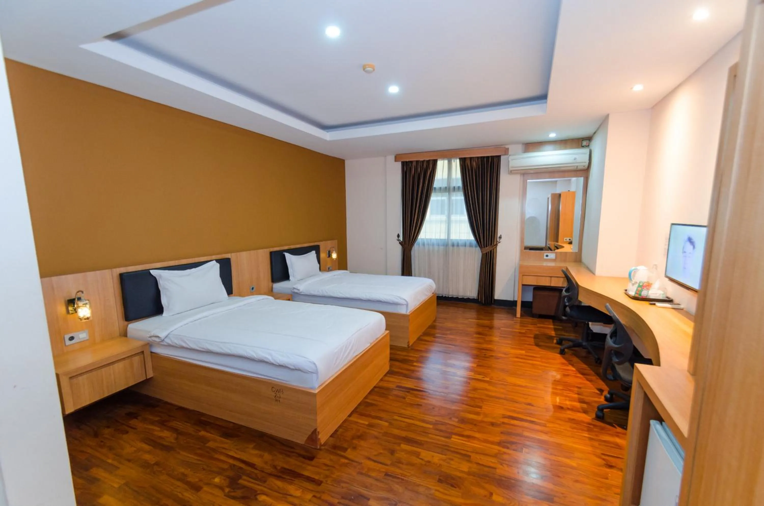 Bed in Graha Widya Bhakti at STIESIA Surabaya