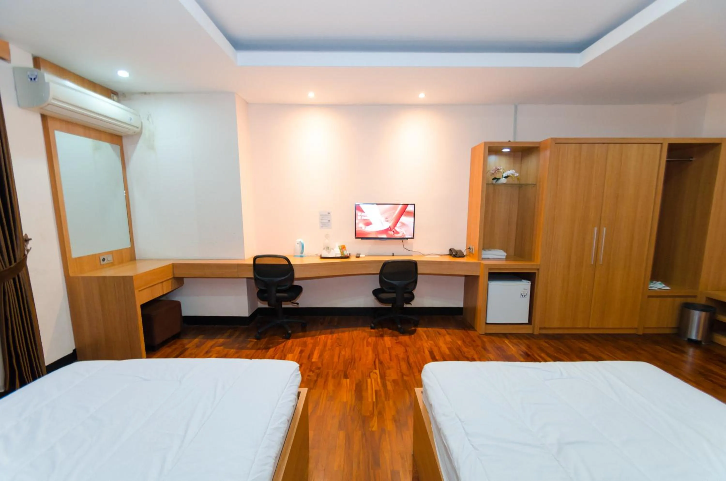 Bed in Graha Widya Bhakti at STIESIA Surabaya