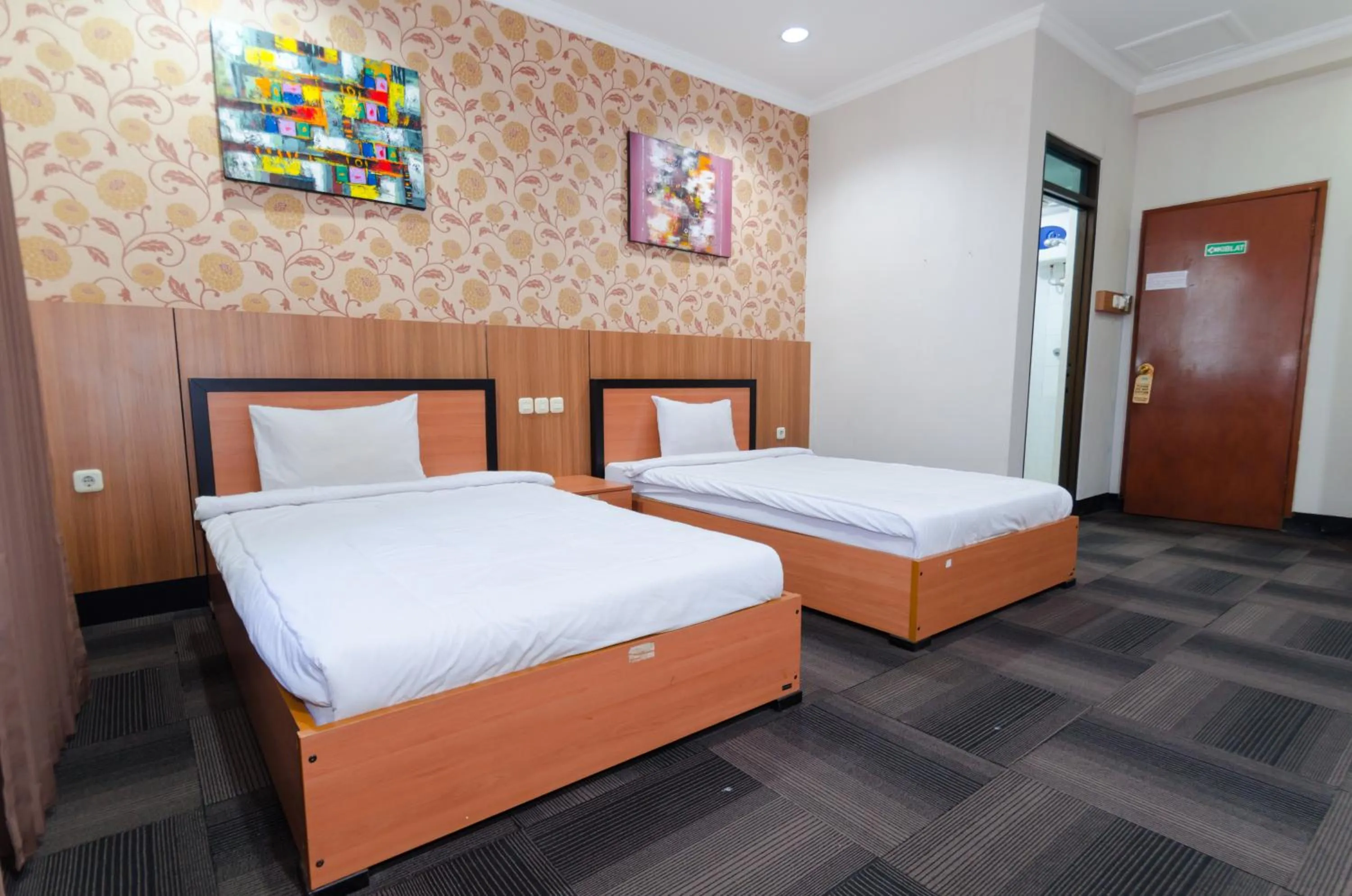 Bed in Graha Widya Bhakti at STIESIA Surabaya