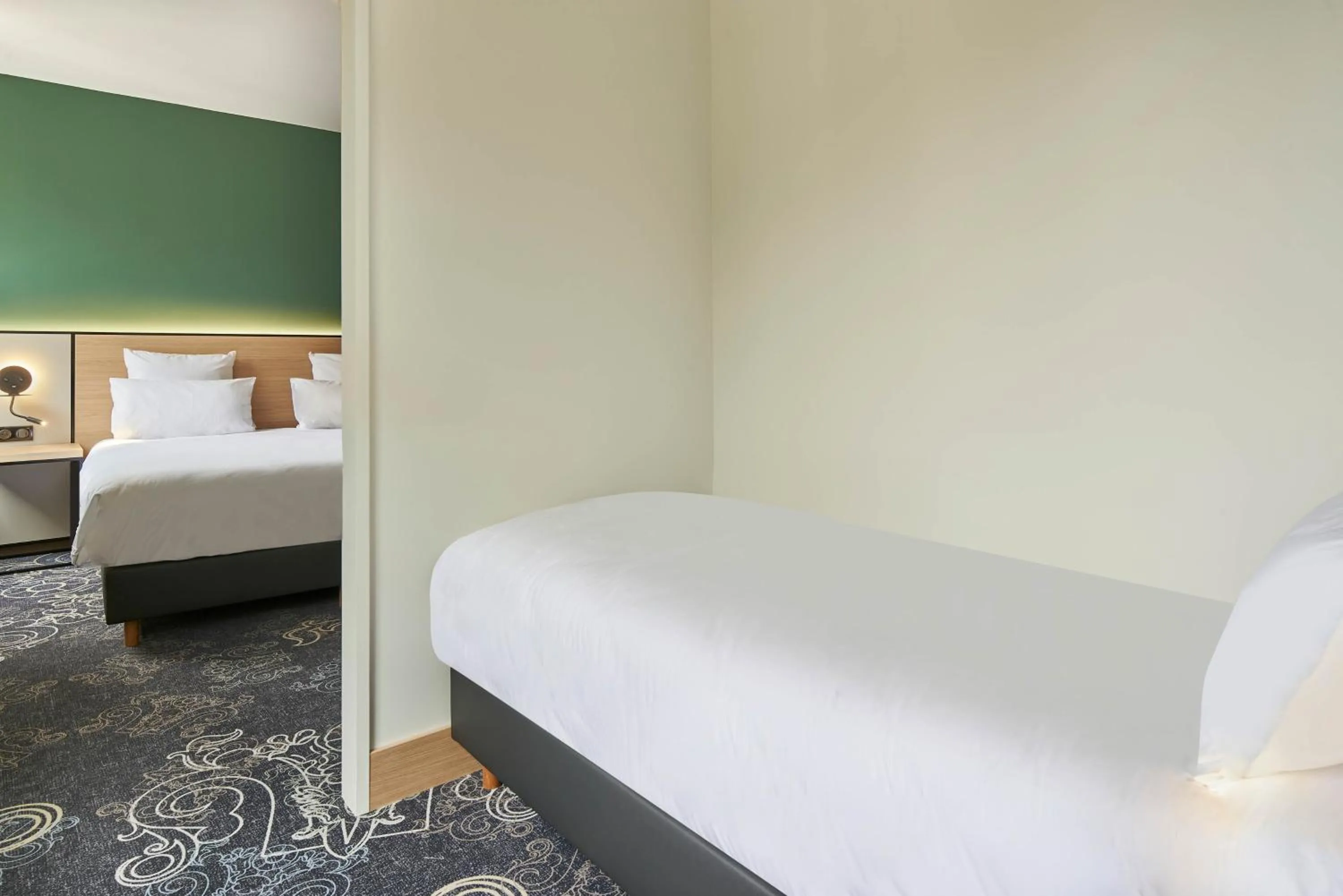 Bed in Le Grand Hôtel, The Originals Relais