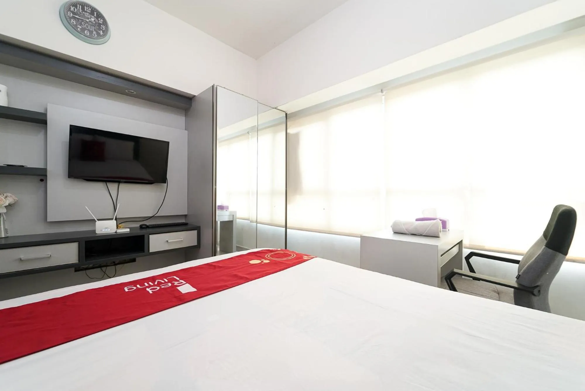 Bed in RedLiving Apartemen Springlake Summarecon - Happy Rooms with Netflix