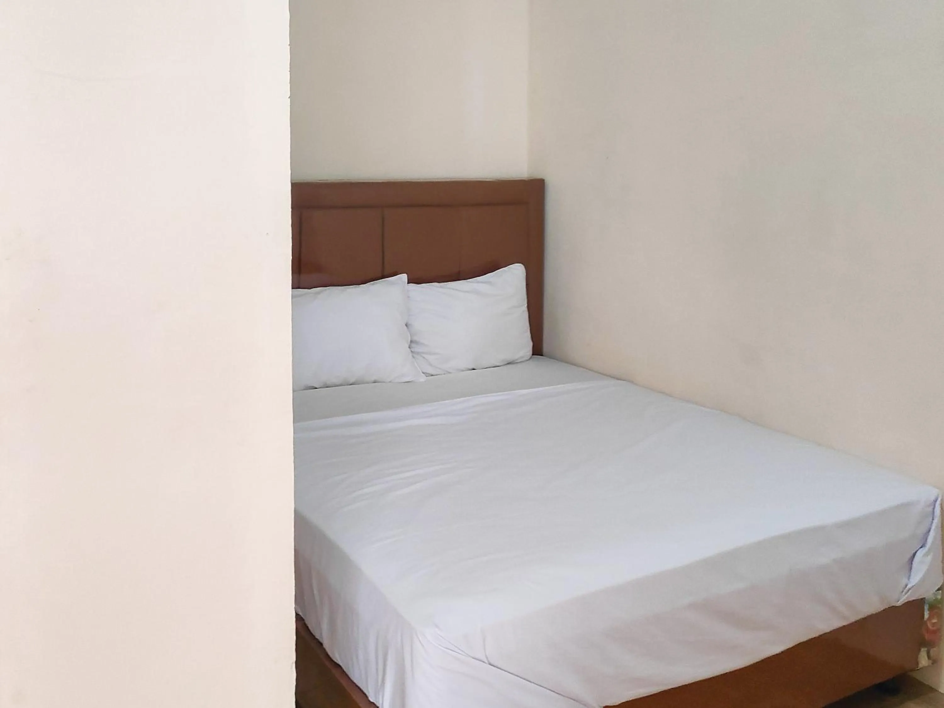 Bedroom, Bed in New Era Family Homestay Binjai Mitra RedDoorz