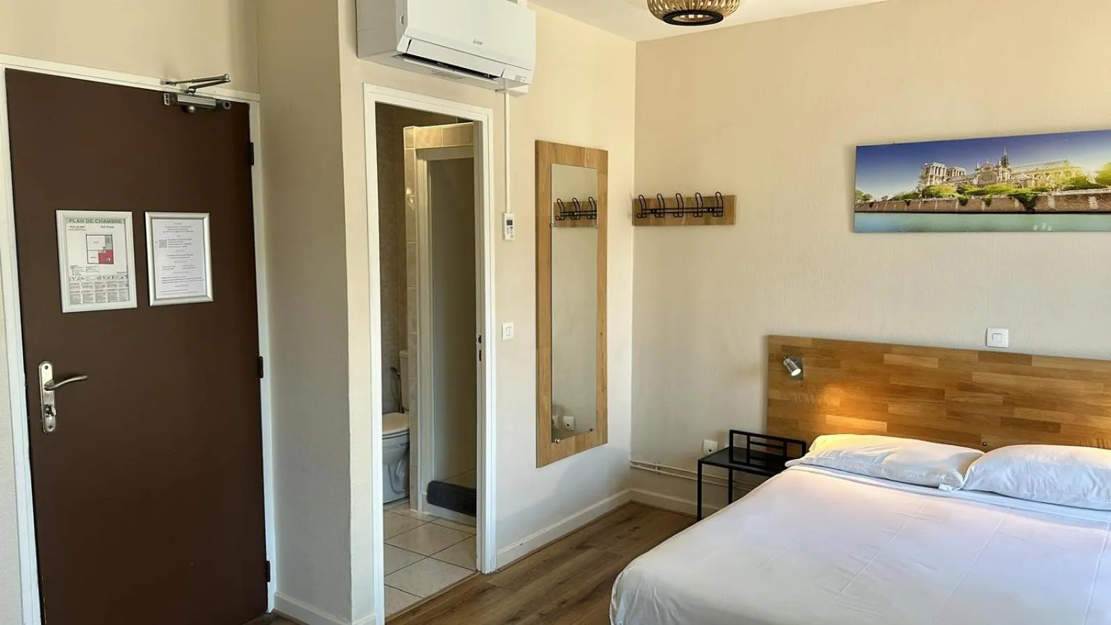 Bed in HOTEL IN PARIS